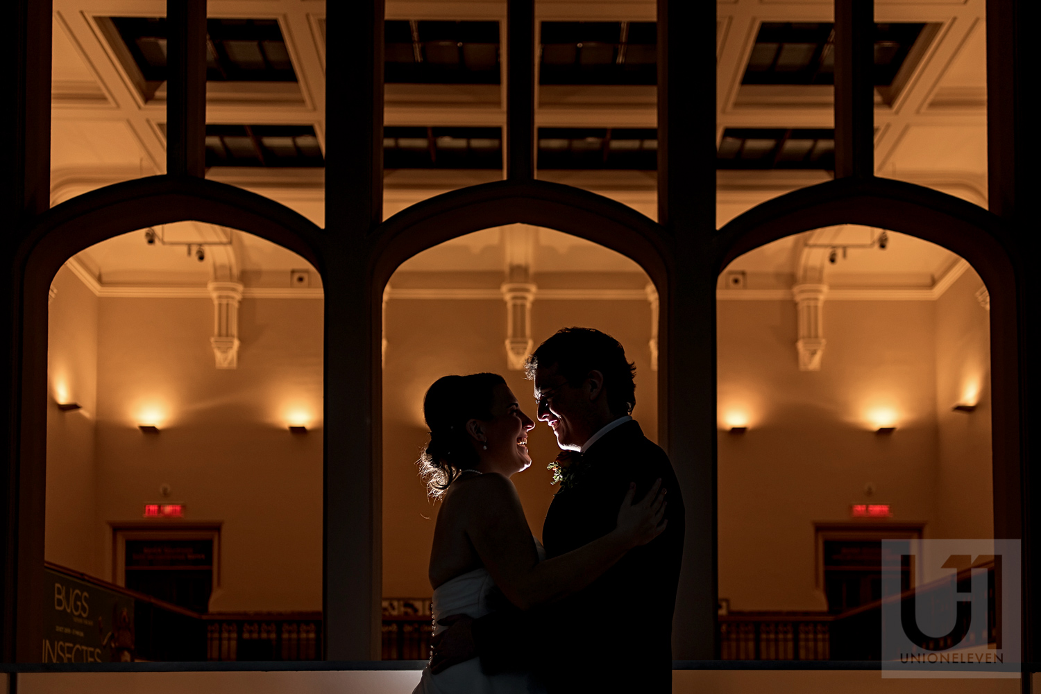 A silhouette photo of the bride and groom during their wedding reception at the Museum of Nature, Ottawa.