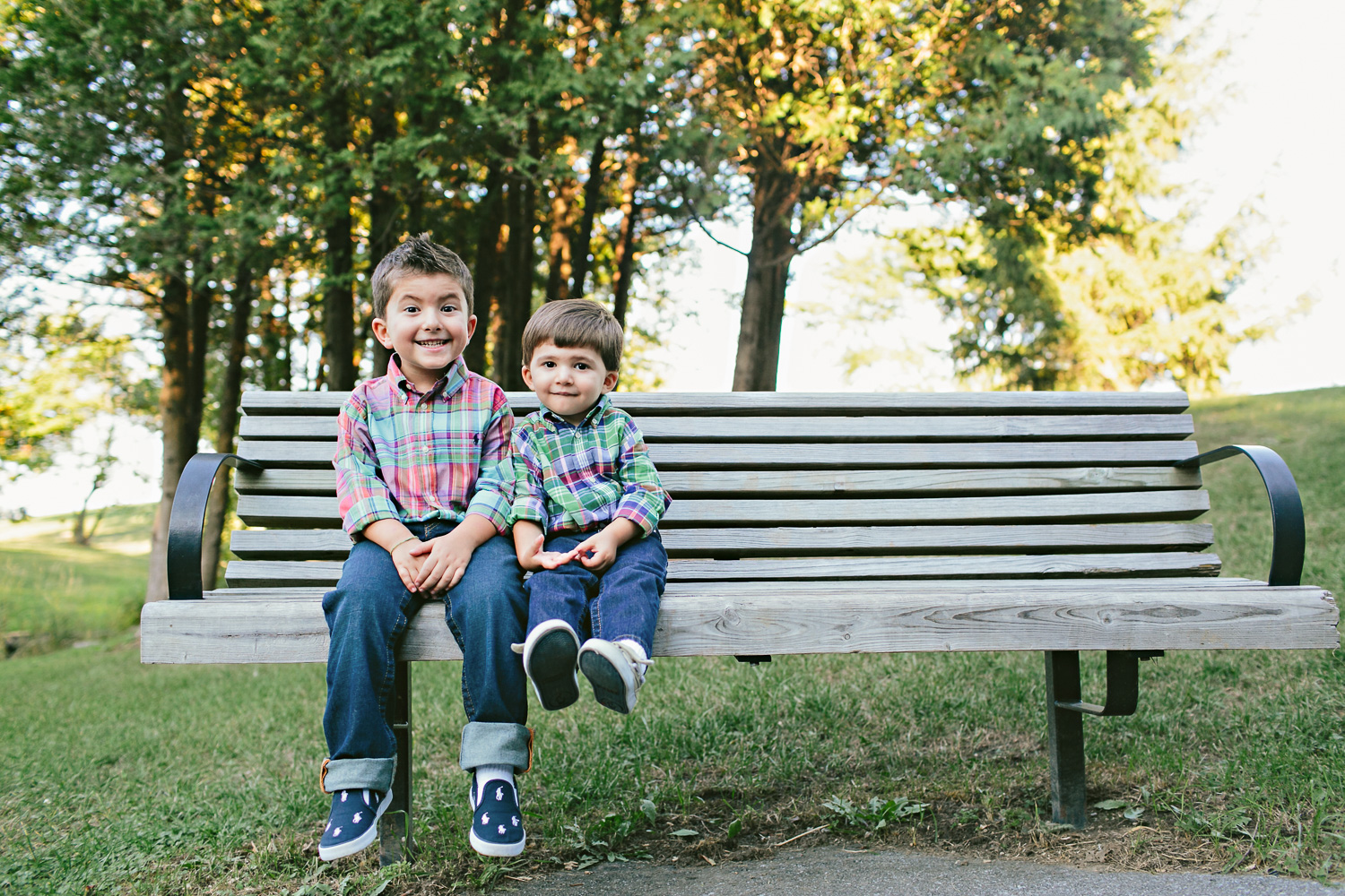 photo of brothers sitting on a bench outside in ottawa (Copy)