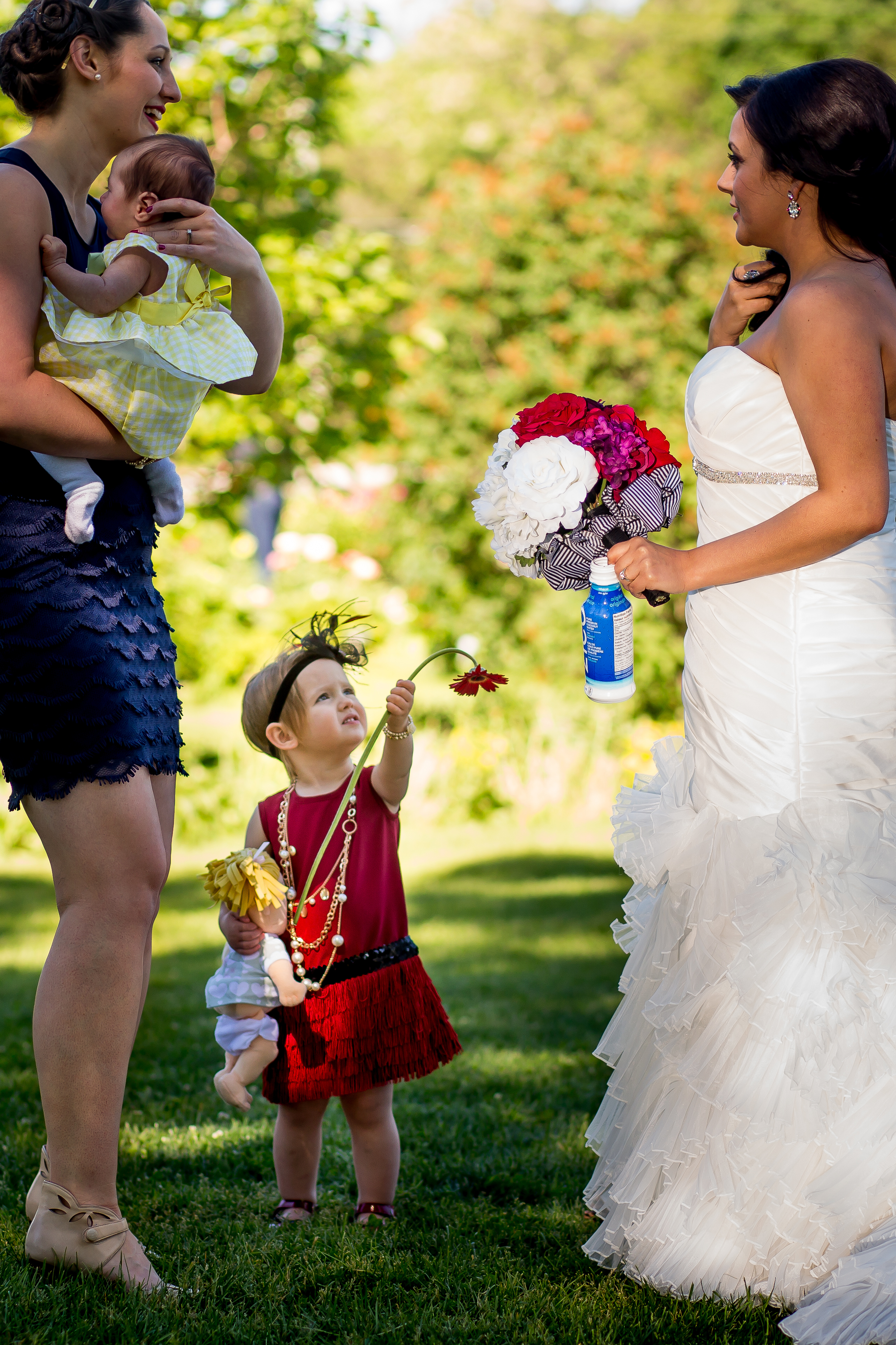 the bride sharing a moment with a few guests during her wedding