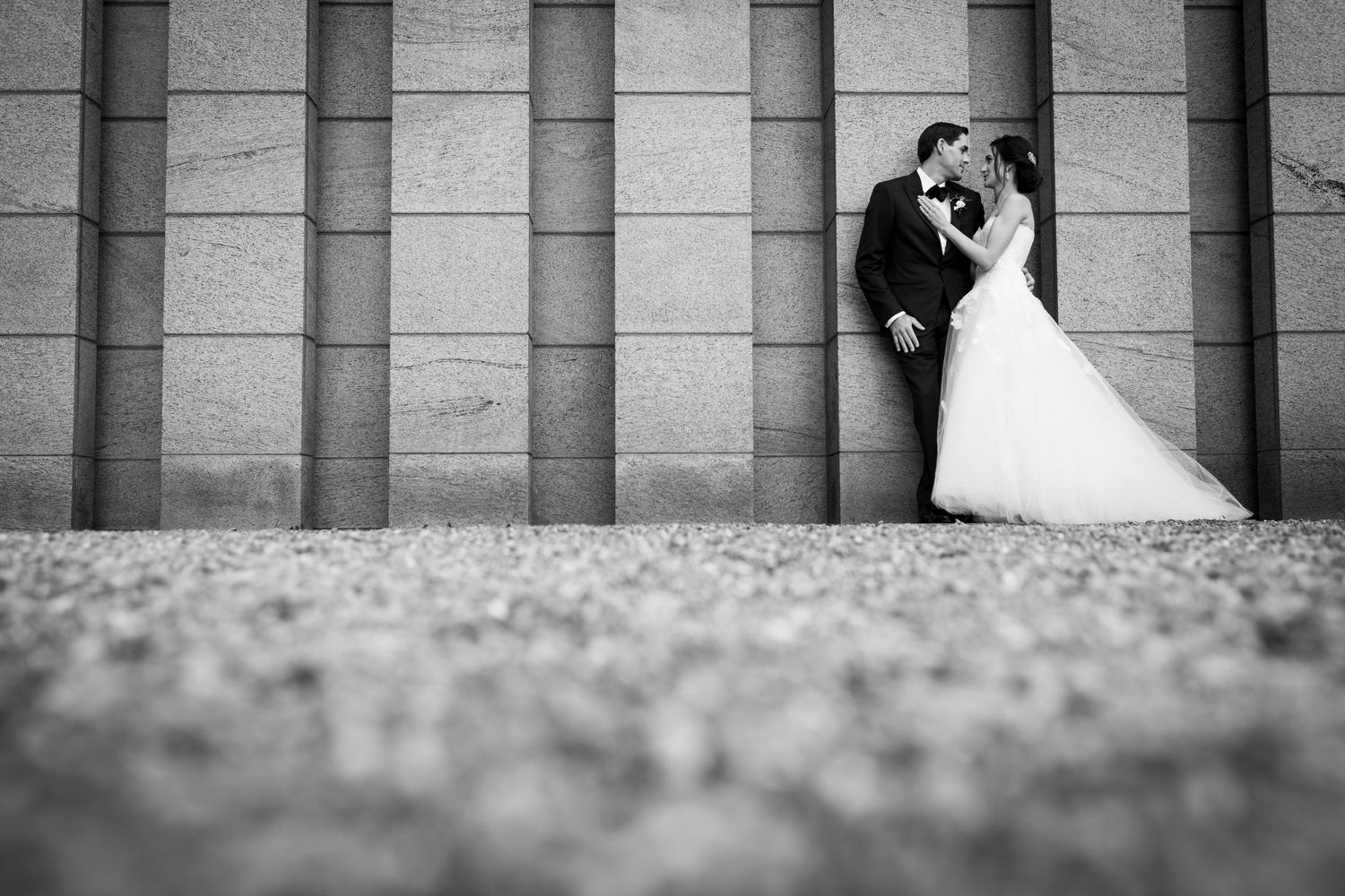 Wedding photograph of a bride and groom outside near the national art gallery