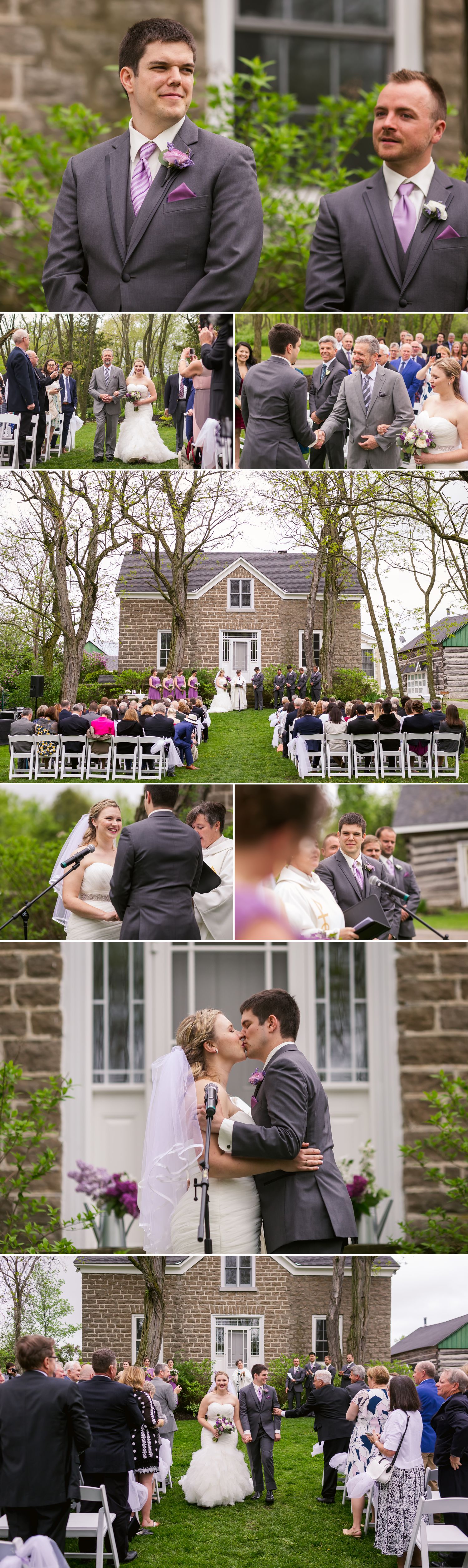 An outdoor spring wedding ceremony infront of the old stone house at Stonefields wedding venue