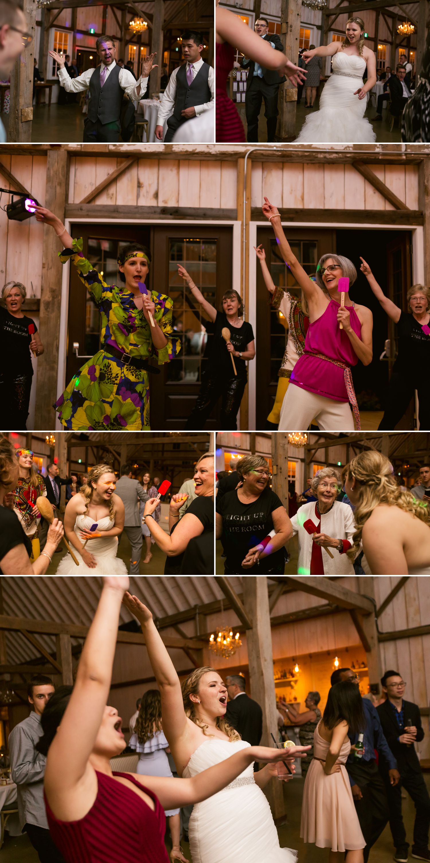 The bride and groom dancing with their guests at their wedding reception inside the newly built Stonefields Loft