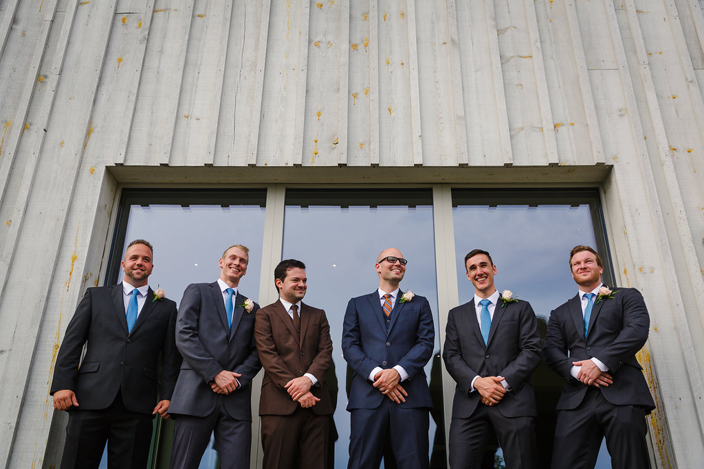 photograph of a groom and his groomsmen