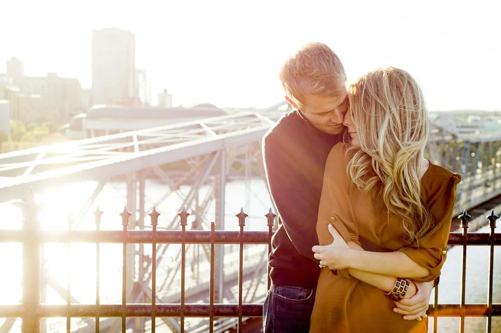 photo of an engaged couple at sunset in downtown ottawa