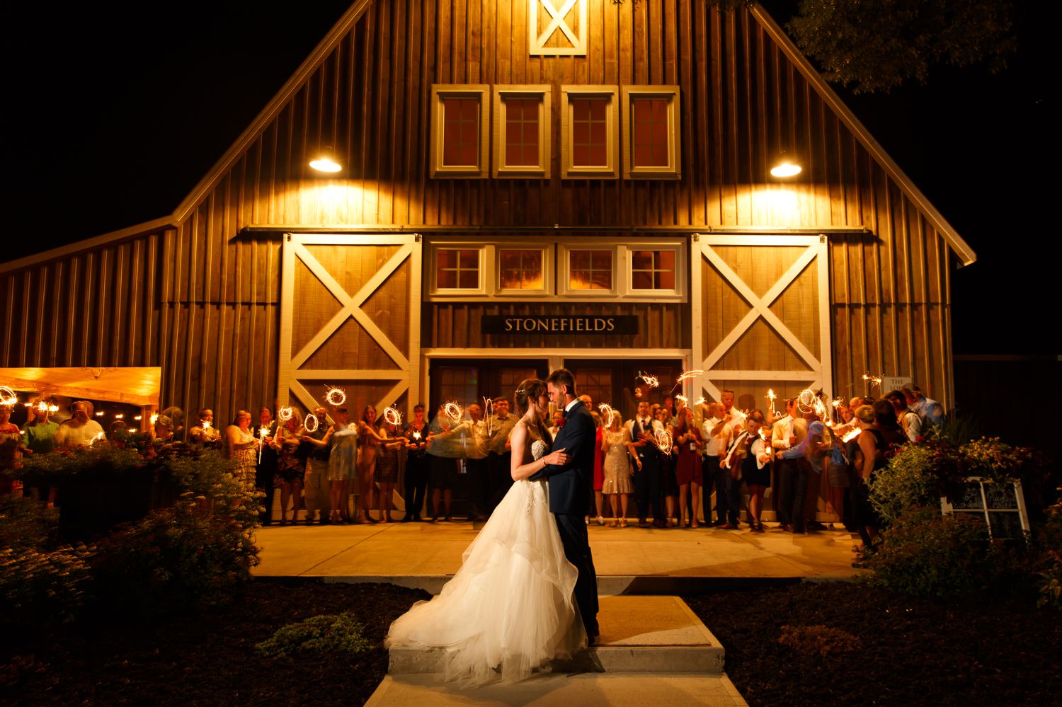 A night time portraits of the bride and groom taken outside Stonefields Estate 