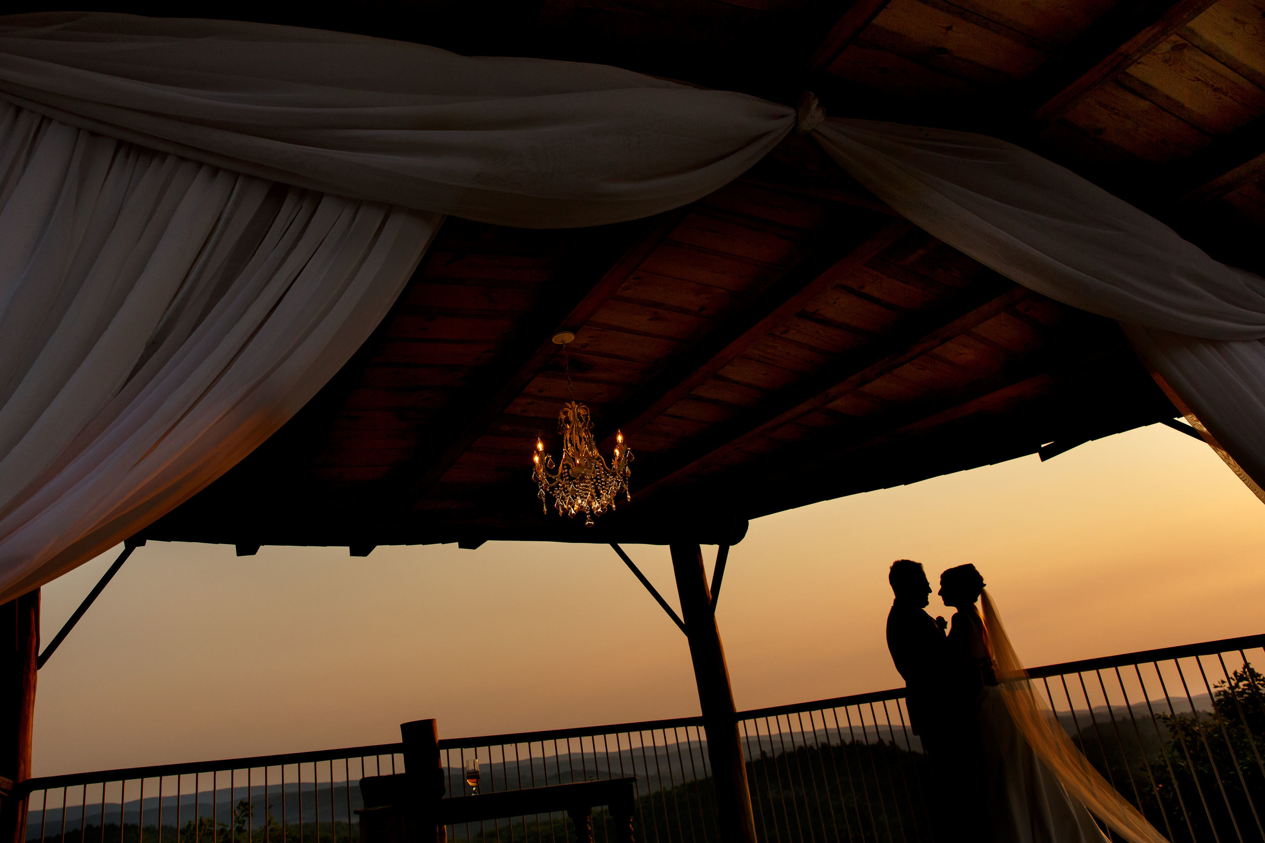 sunset photo of a bride and groom at le belvedere