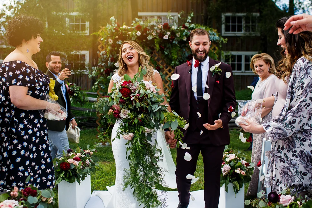 Bride and groom walking down the isle on their wedding day