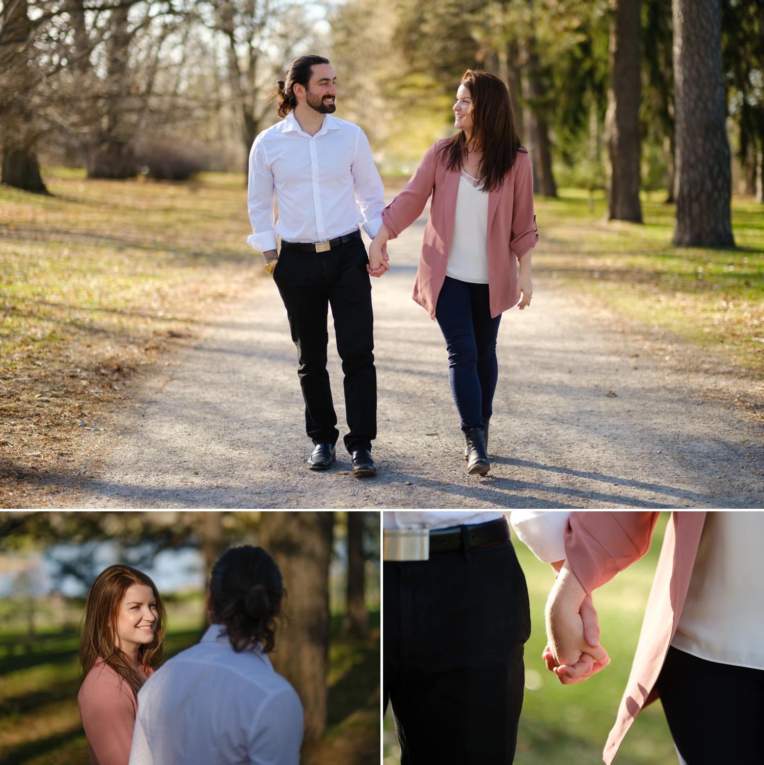 happy couple walking through the arboretum during their engagement shoot