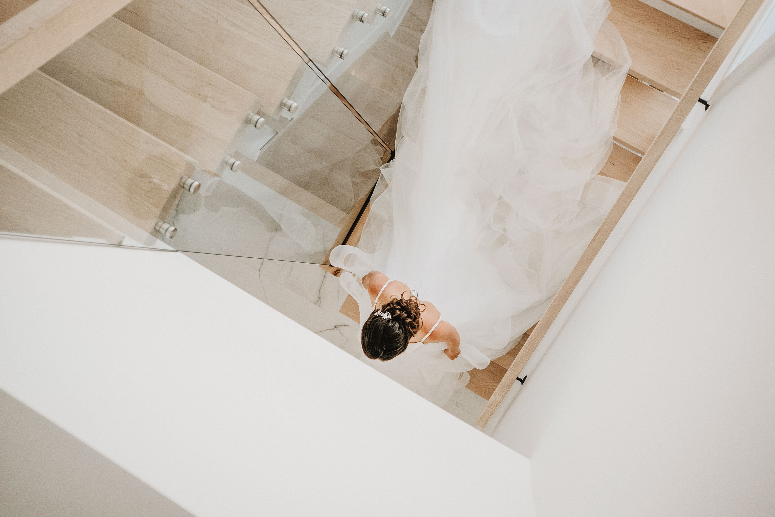 bride walks down stairs on her way to her stonefields wedding ceremony in carleton place ontario (Copy)