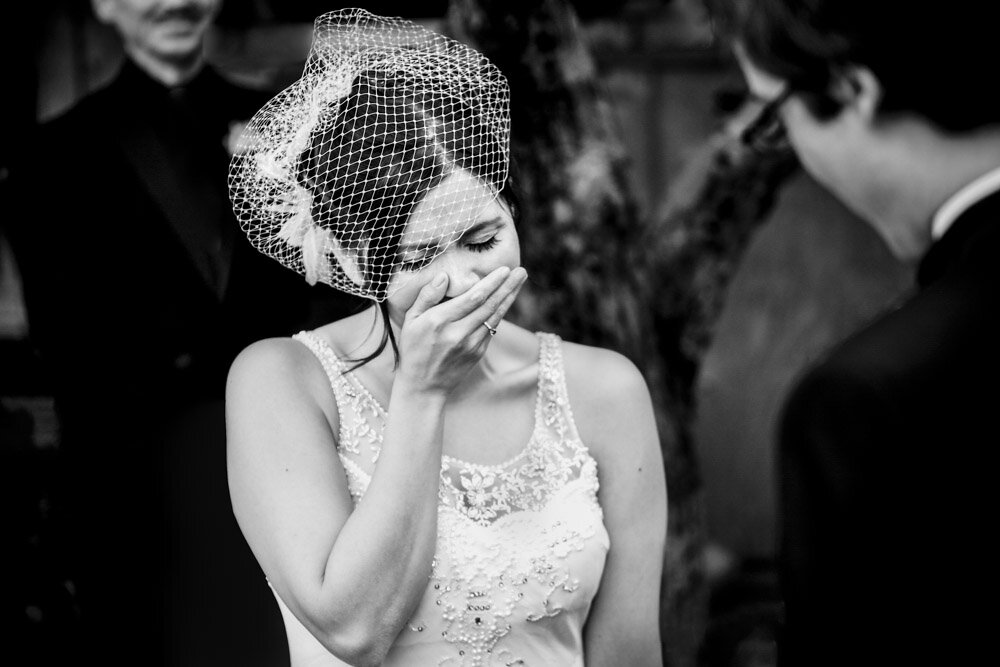 emotional candid moment at a backyard wedding