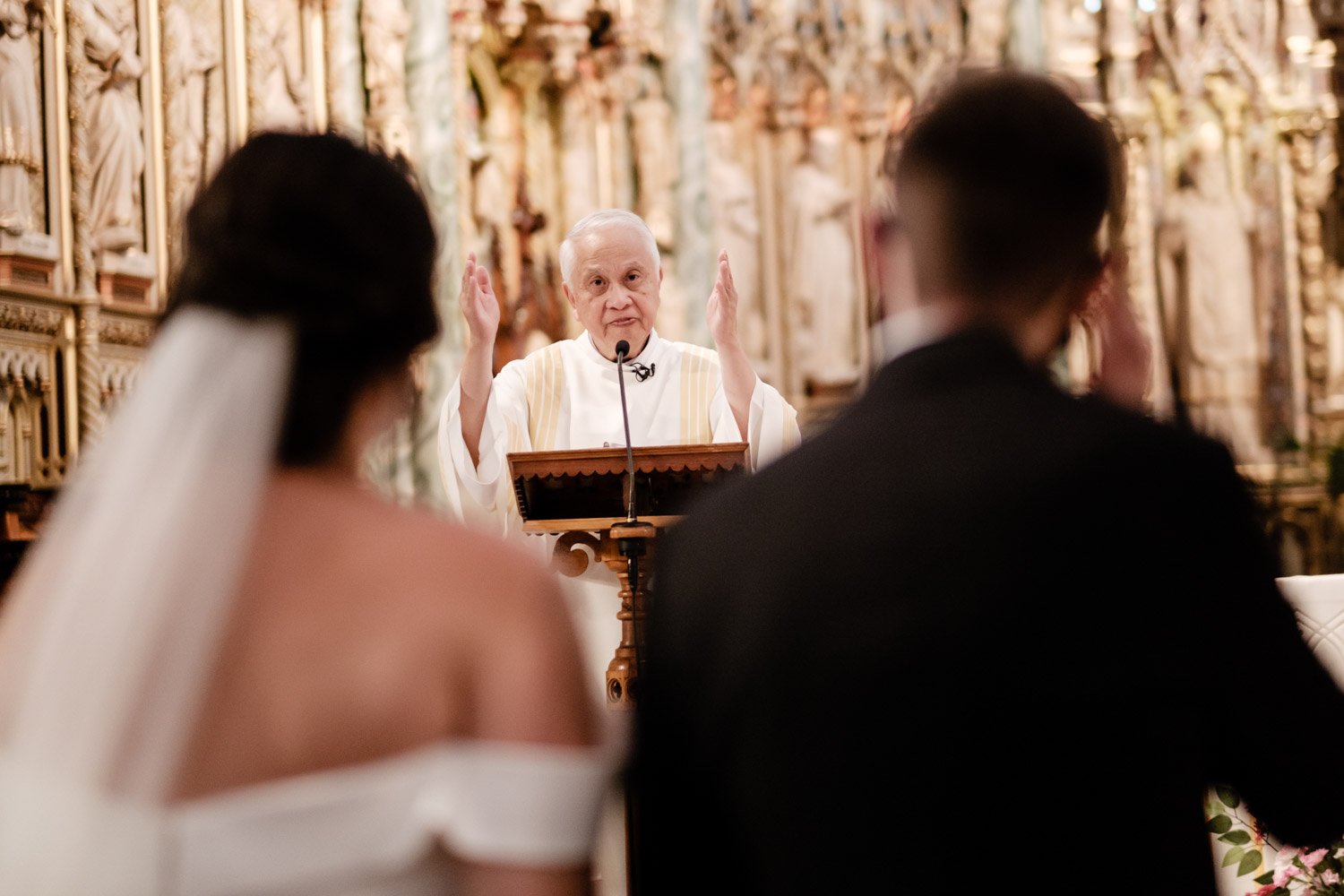 candid wedding ceremony photo at Notre dame cathedral