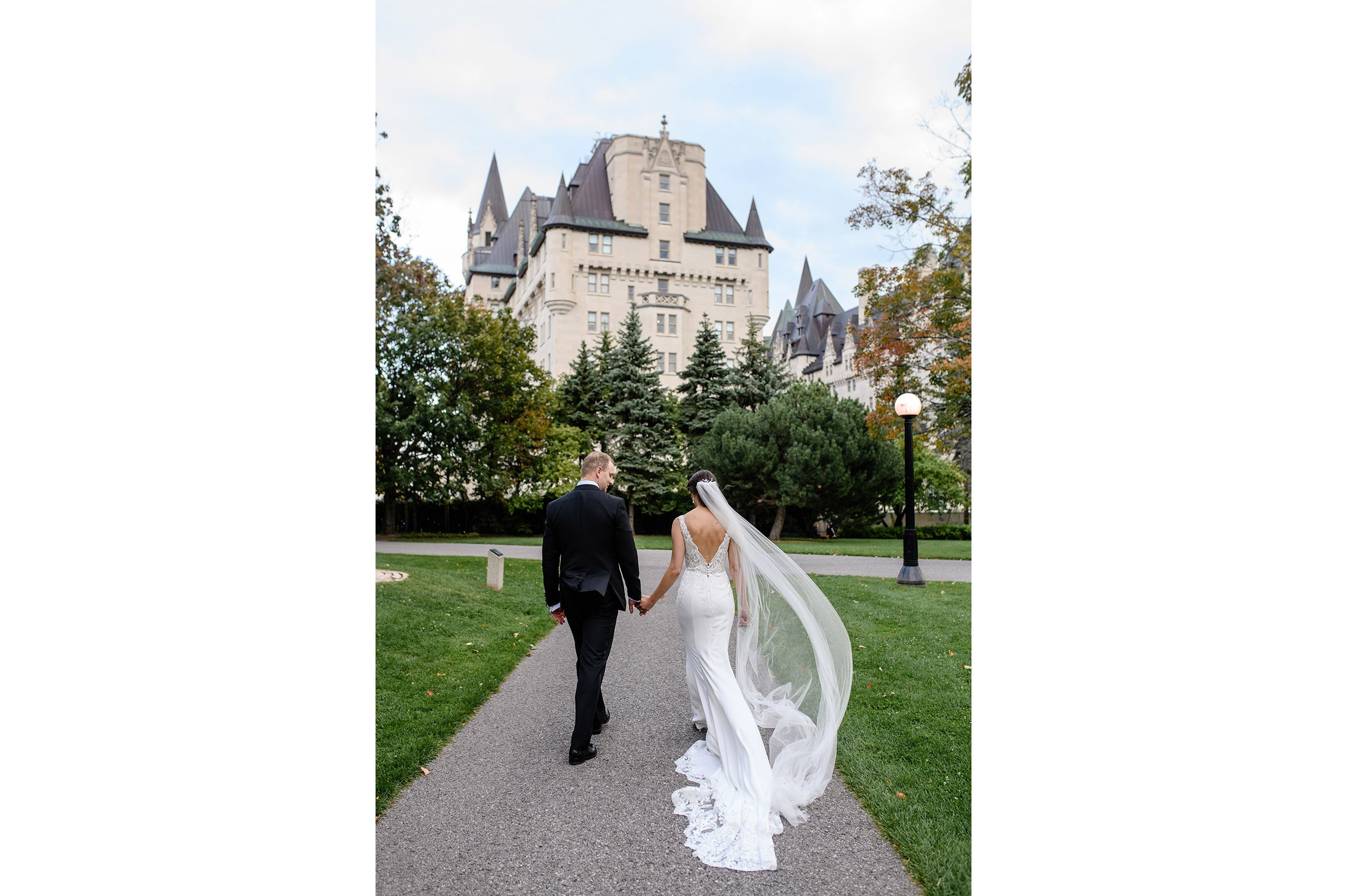 bride and groom walk to their chateau laurier wedding reception (Copy)