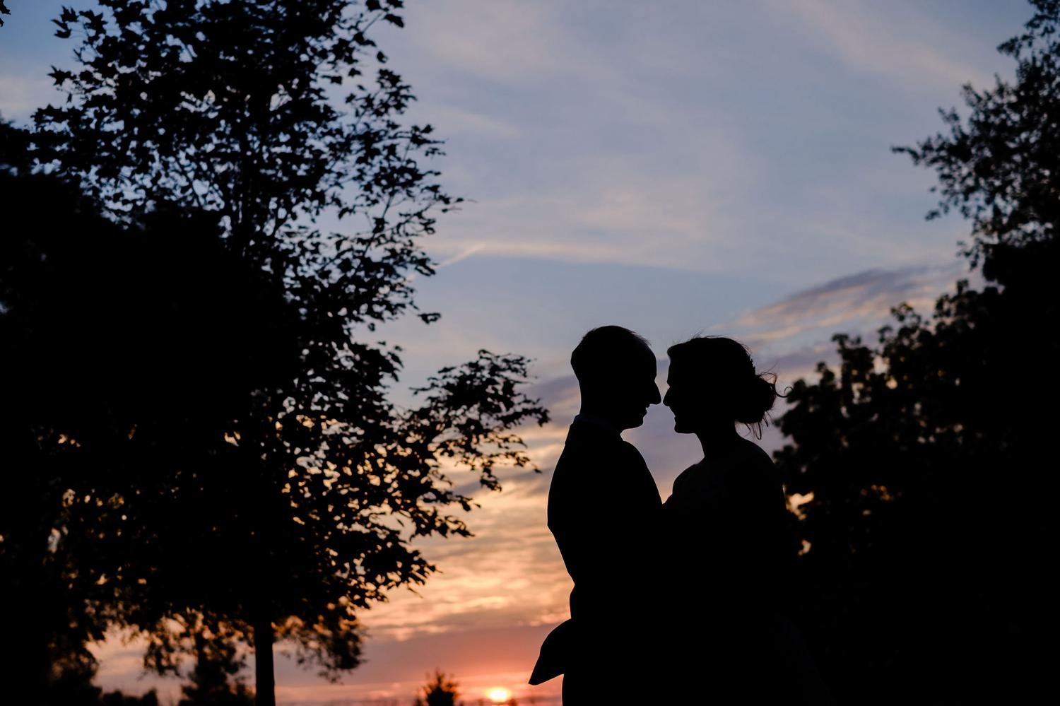 a sunset wedding photo at stonefields estate
