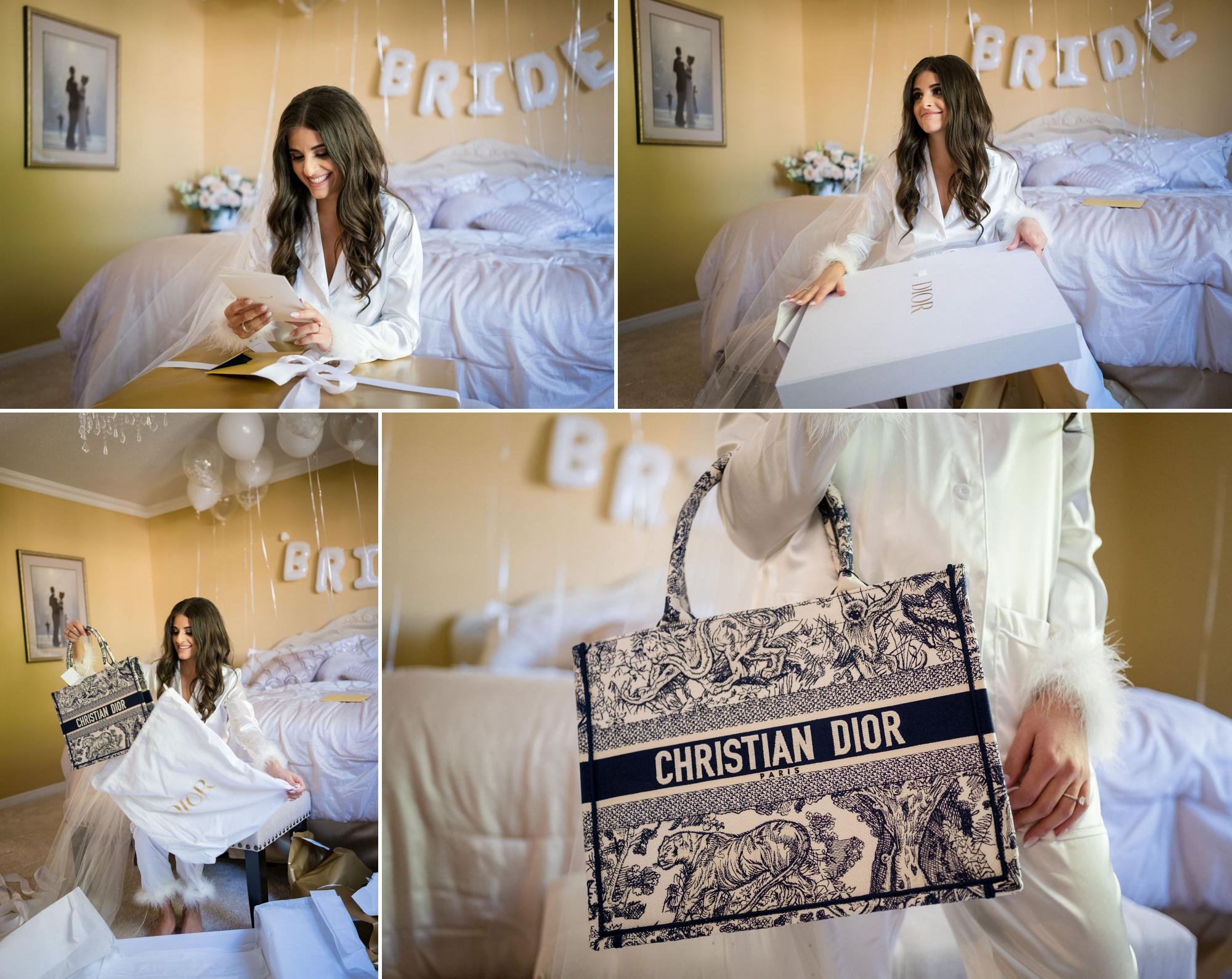 a bride opens her wedding gift from her groom on the morning of her wedding