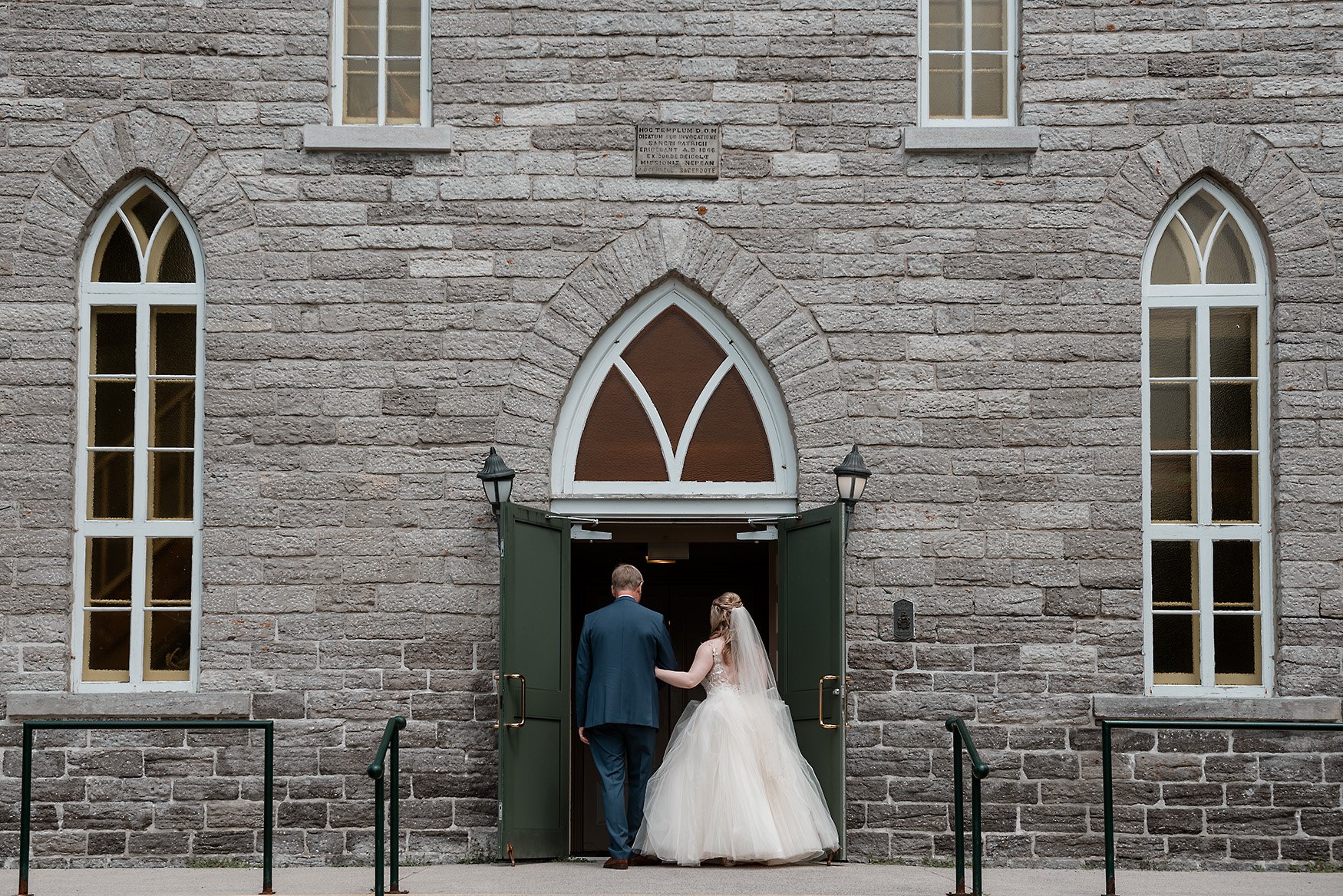 bride and father walk into fallowfield church in richmond ontario