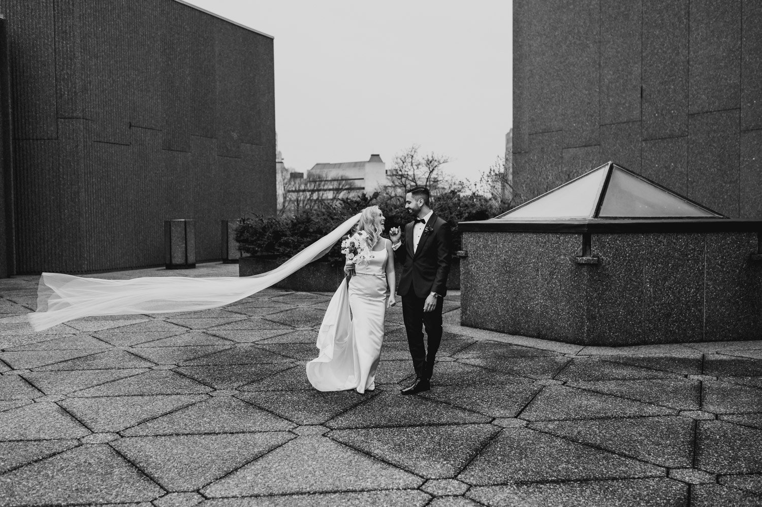 black and white photograph of a bride and groom at the NAC in ottawa