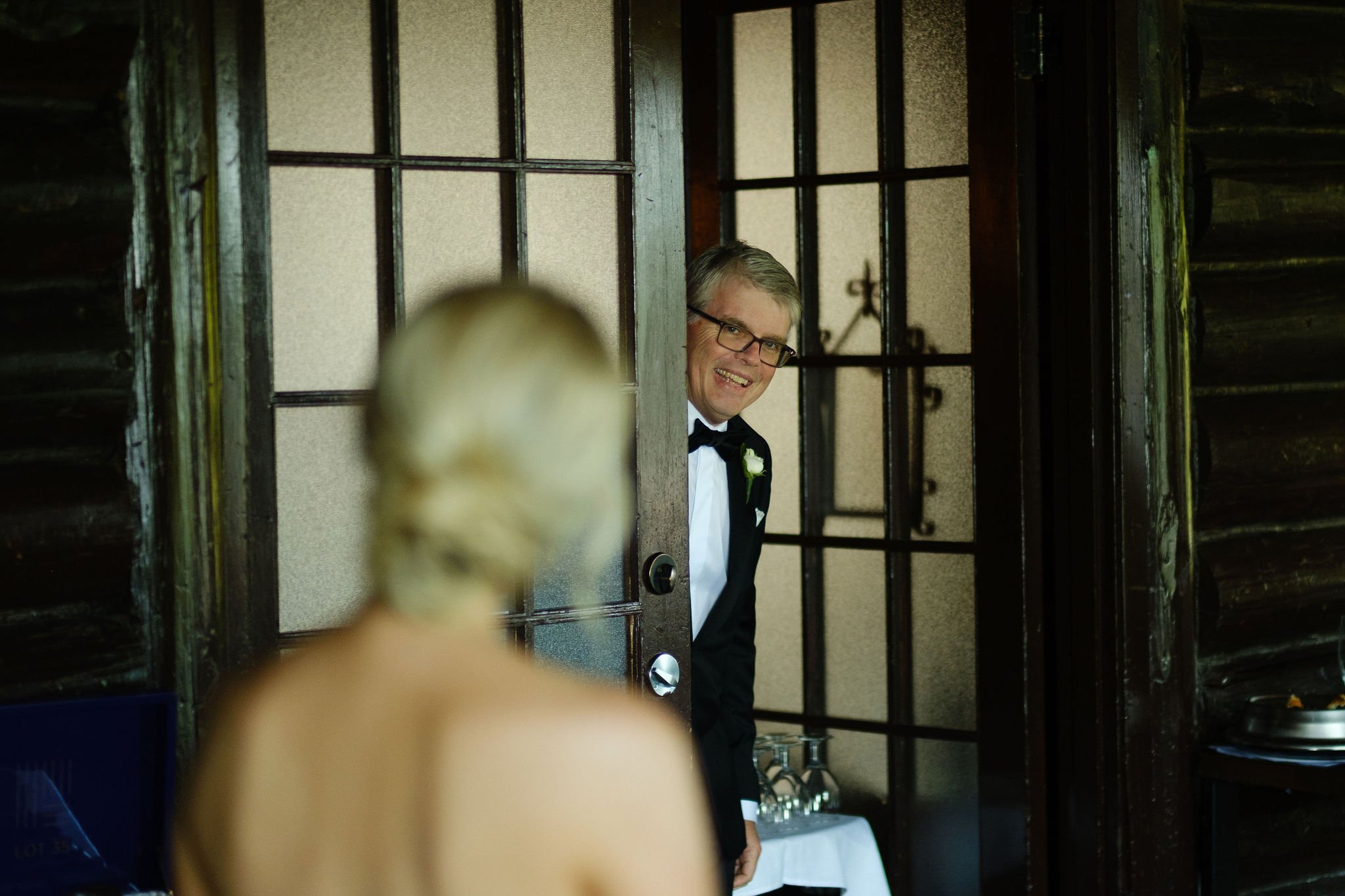 a bride's dad sees her in her wedding dress for the first time.