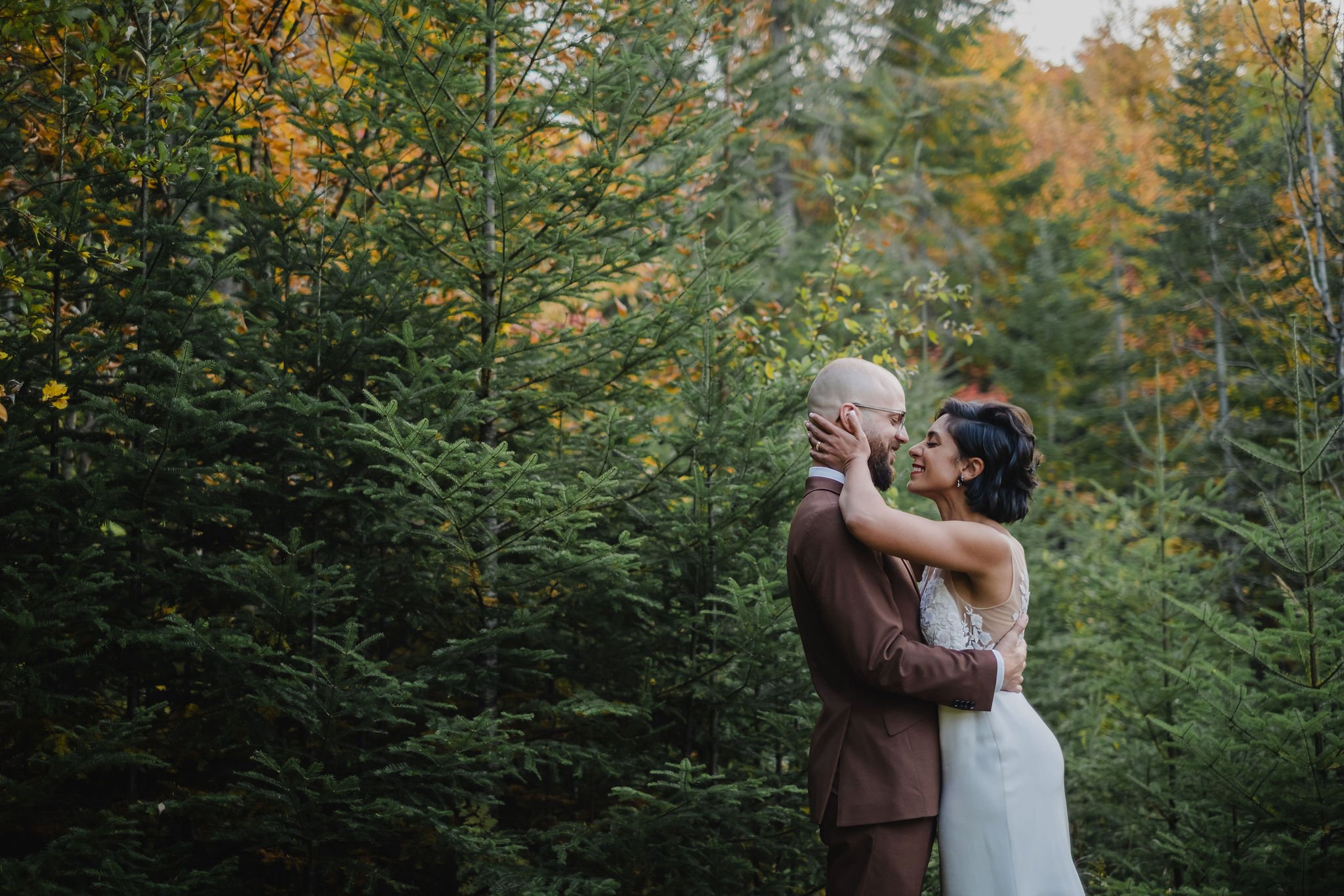 natural light wedding photo of a couple in the first in mont Tremblant