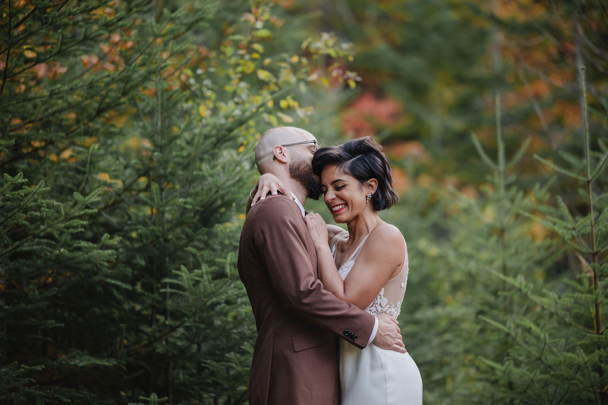 natural light wedding photo of a couple in the first in mont Tremblant