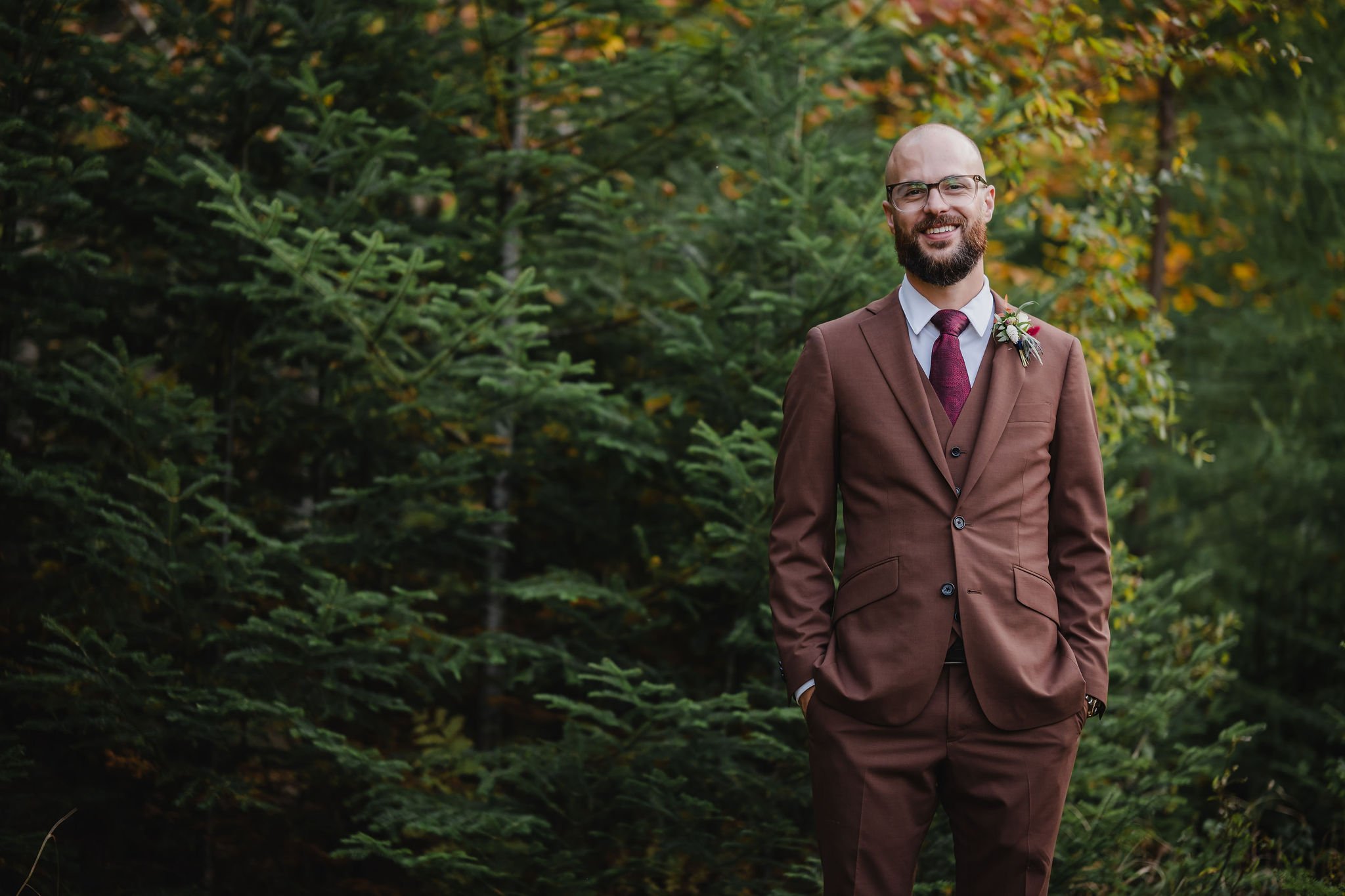 groom portrait in the forest