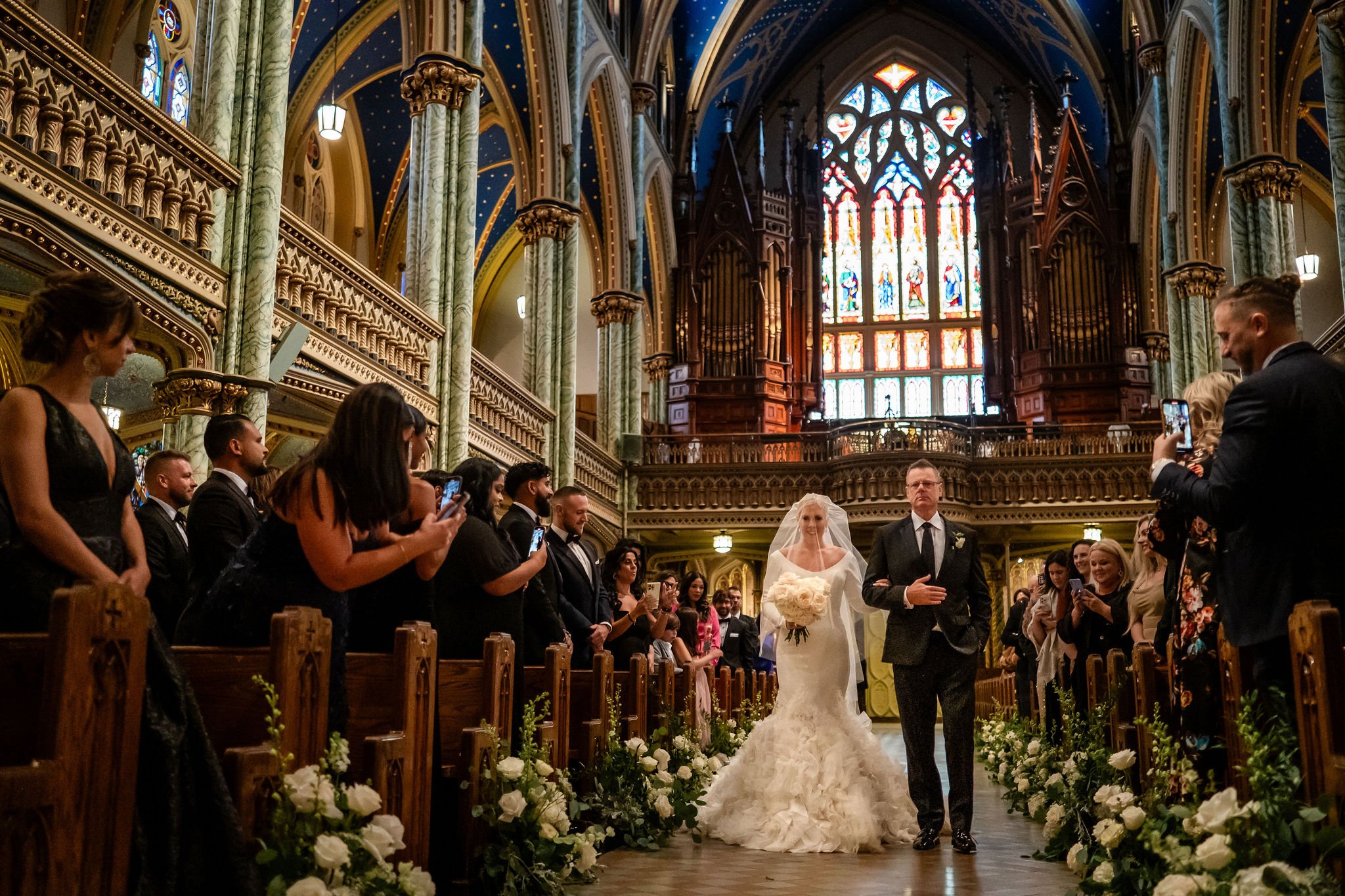 photograph from a wedding ceremony in ottawa's Notre dame basilica 