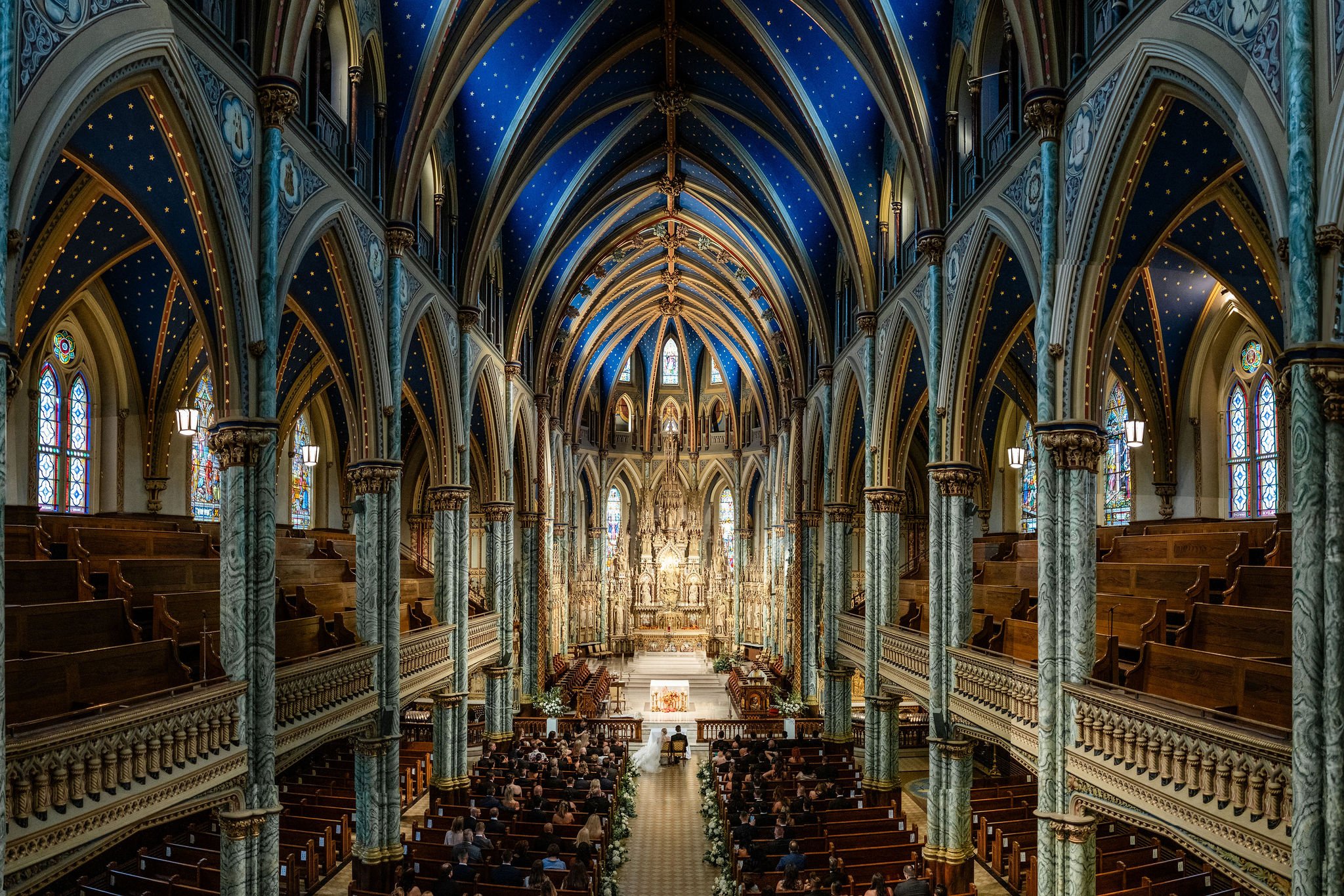 photograph from a wedding ceremony in ottawa's Notre dame basilica 
