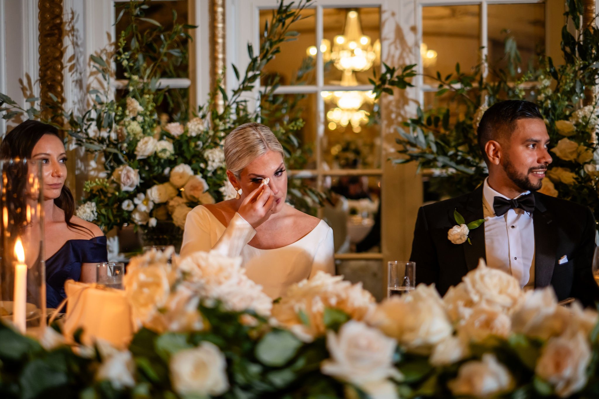 photograph of emotional speech reactions at wedding