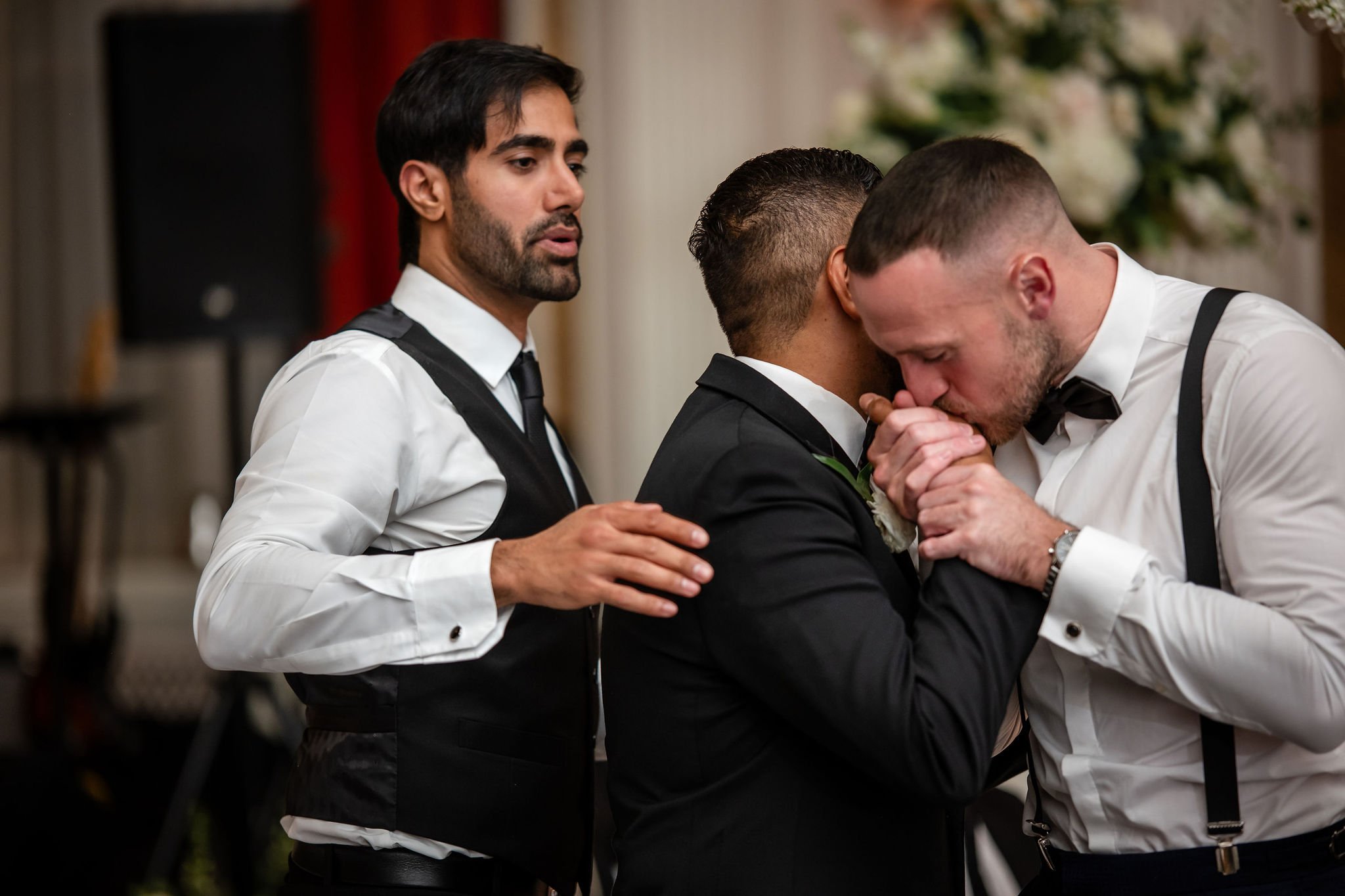 photograph of emotional speech reactions at wedding