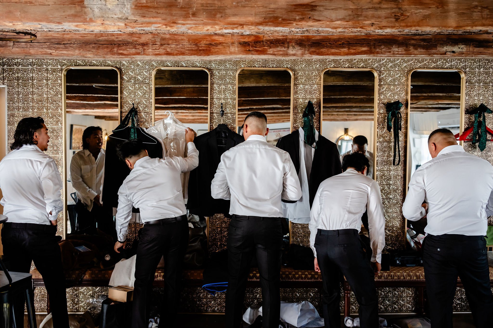 groomsmen getting ready in the pub at stonefields estate
