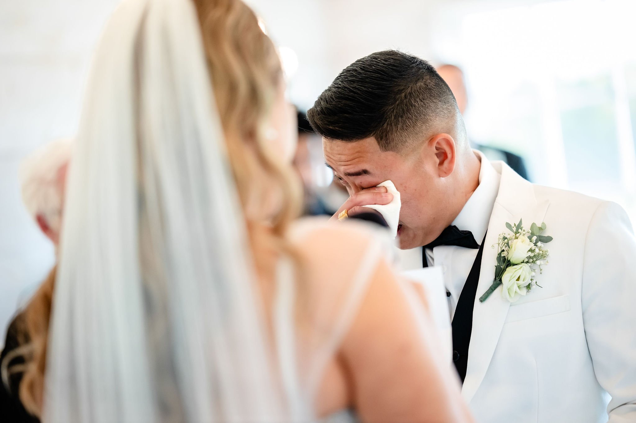 candid wedding ceremony photograph at an indoor stonefields estate wedding