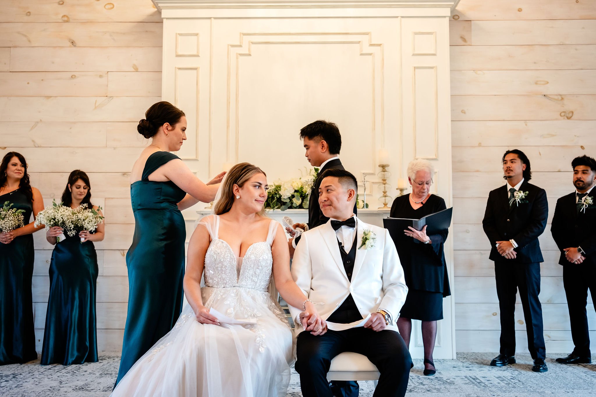 candid wedding ceremony photograph at an indoor stonefields estate wedding