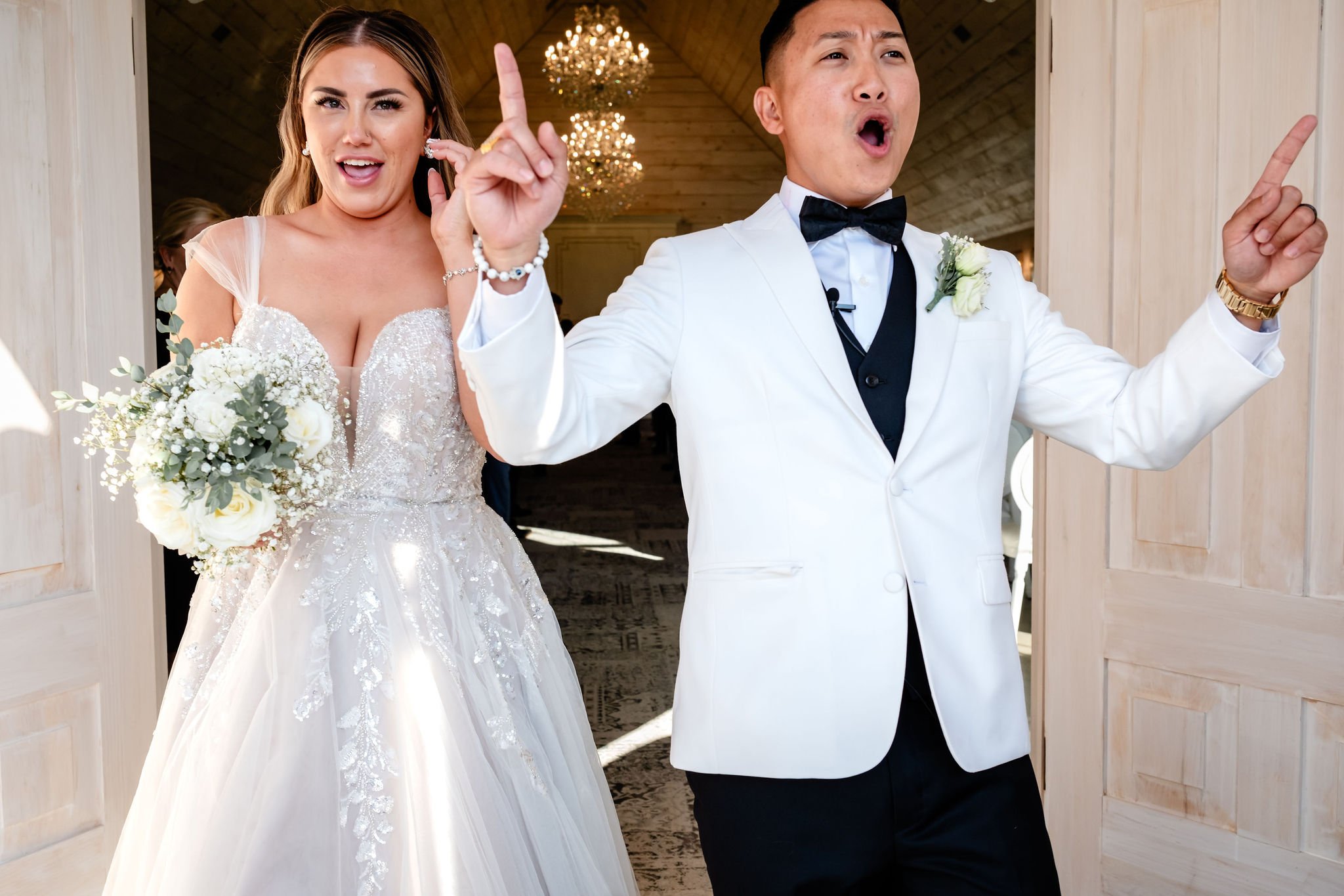 a couple celebrating after their wedding ceremony at stonefields estate