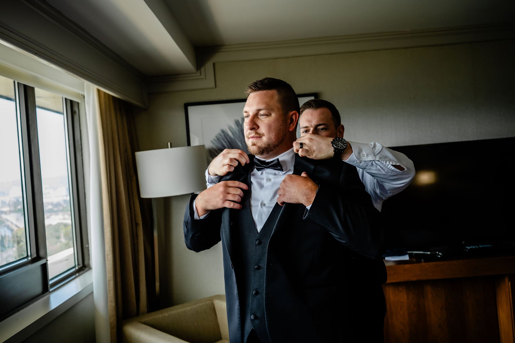 photos of a groom getting ready for his wedding at the Westin hotel