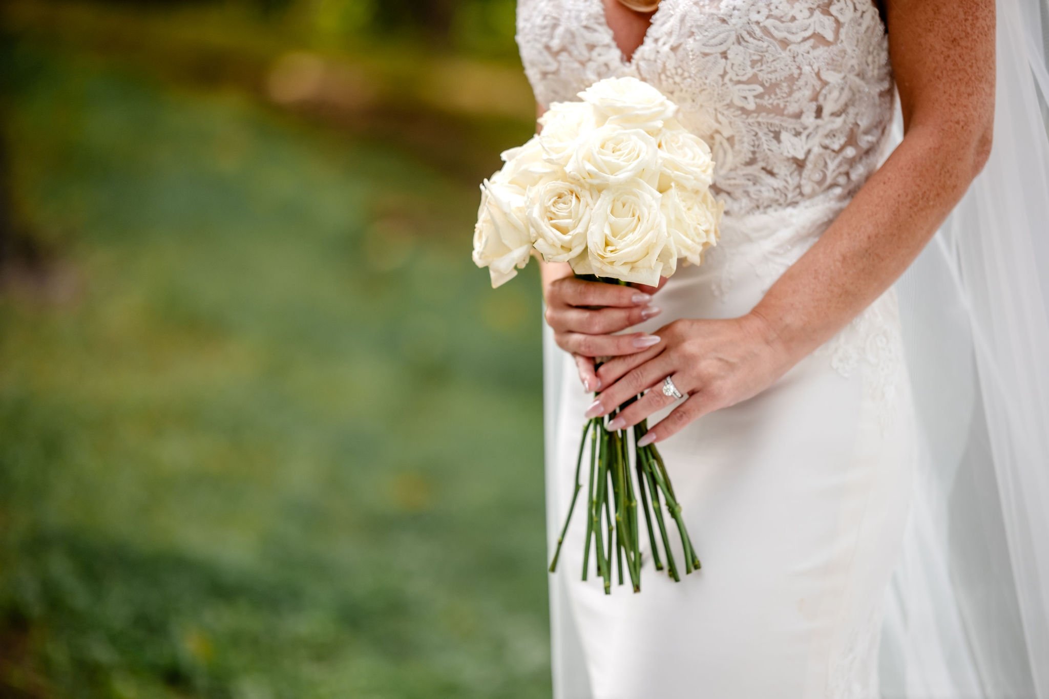 photograph of a bride in her wedding dress at rockcliffe park in ottawa