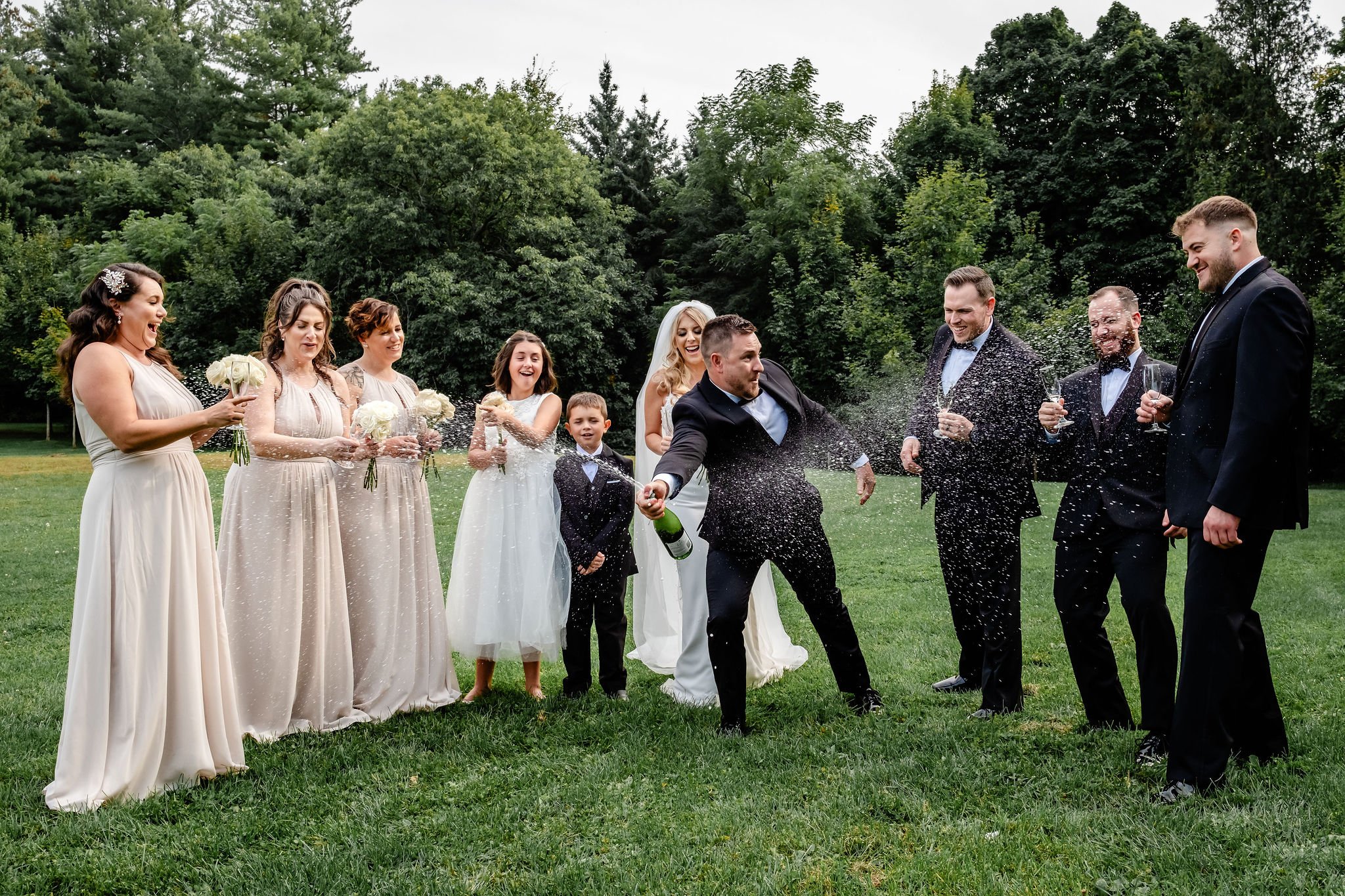 wedding party photograph at rockcliffe park in ottawa