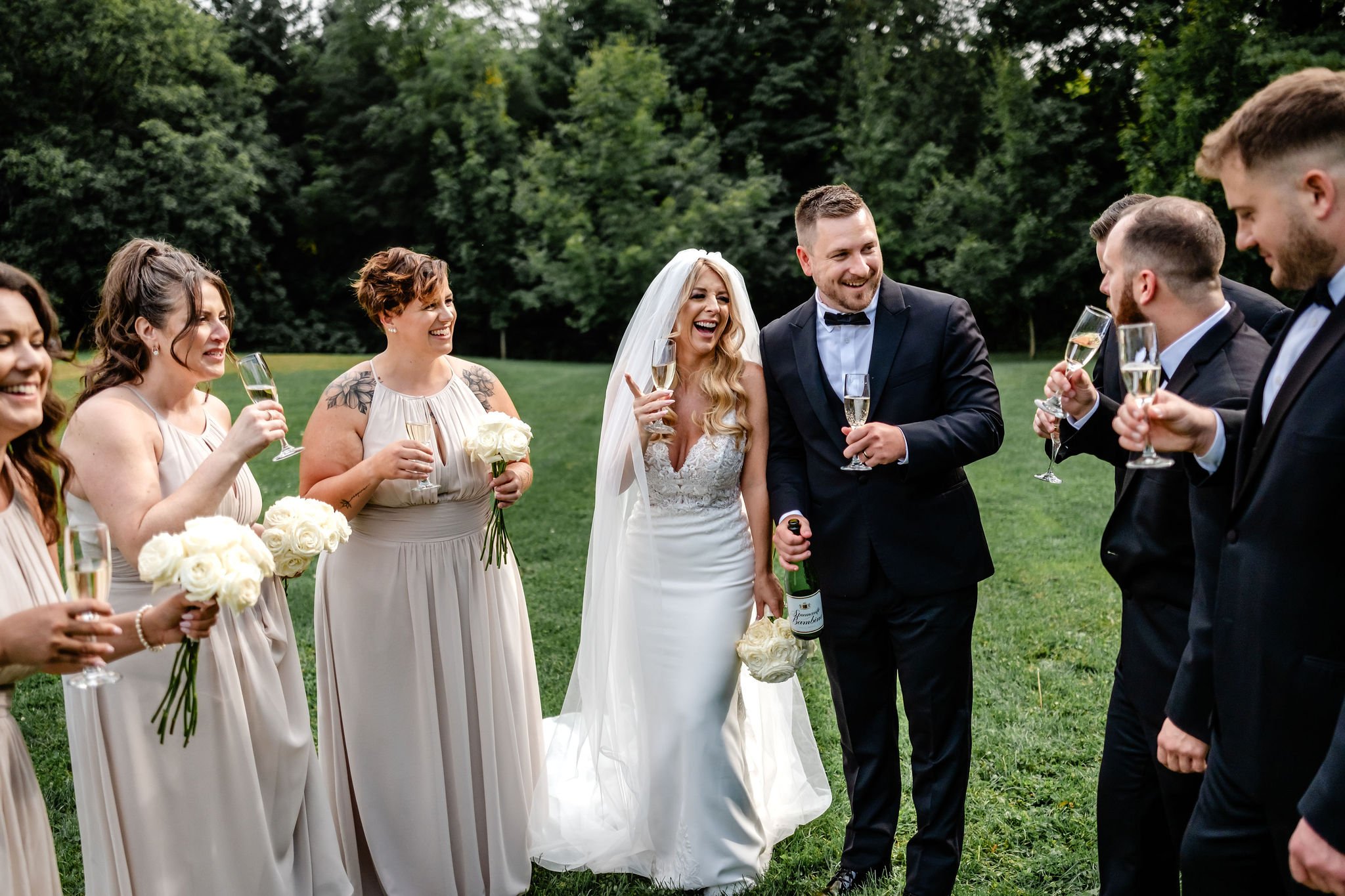 wedding party photograph at rockcliffe park in ottawa