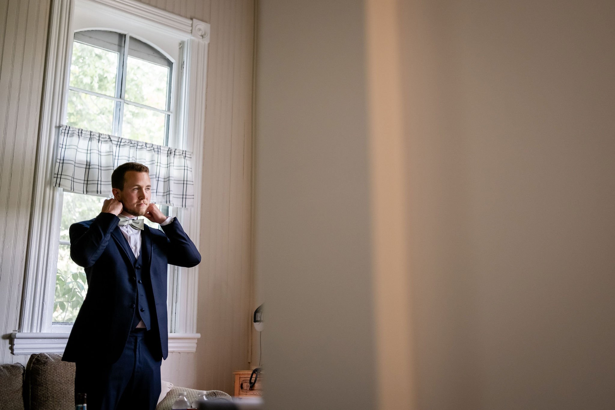photo of a groom getting ready for his Strathmere wedding