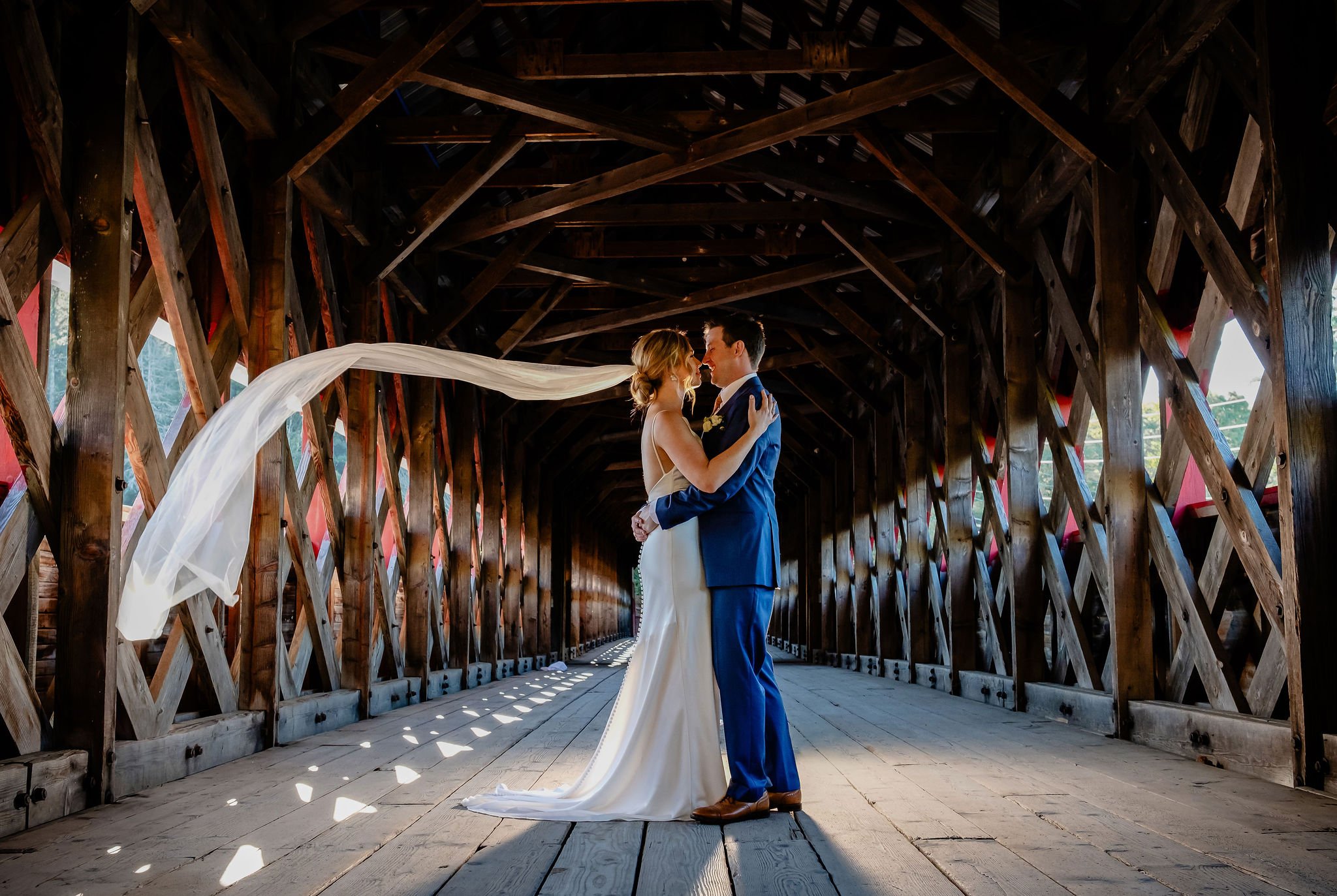 a portrait of a bride and groom at the covered bride near Wakefield Quebec 