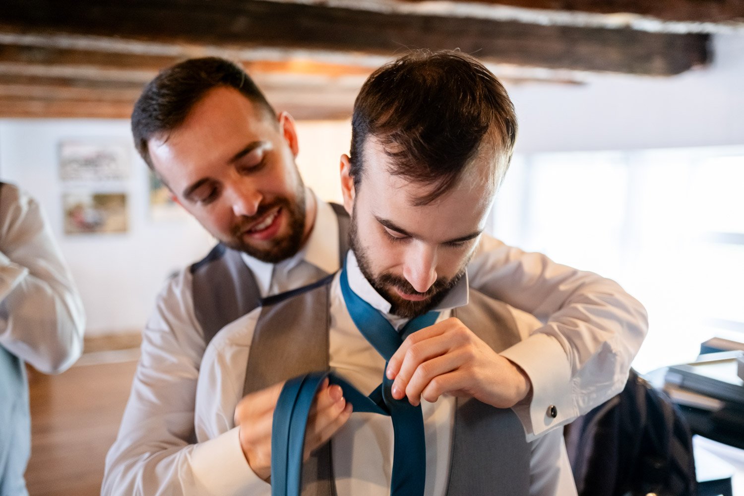 photograph of groomsmen getting ready