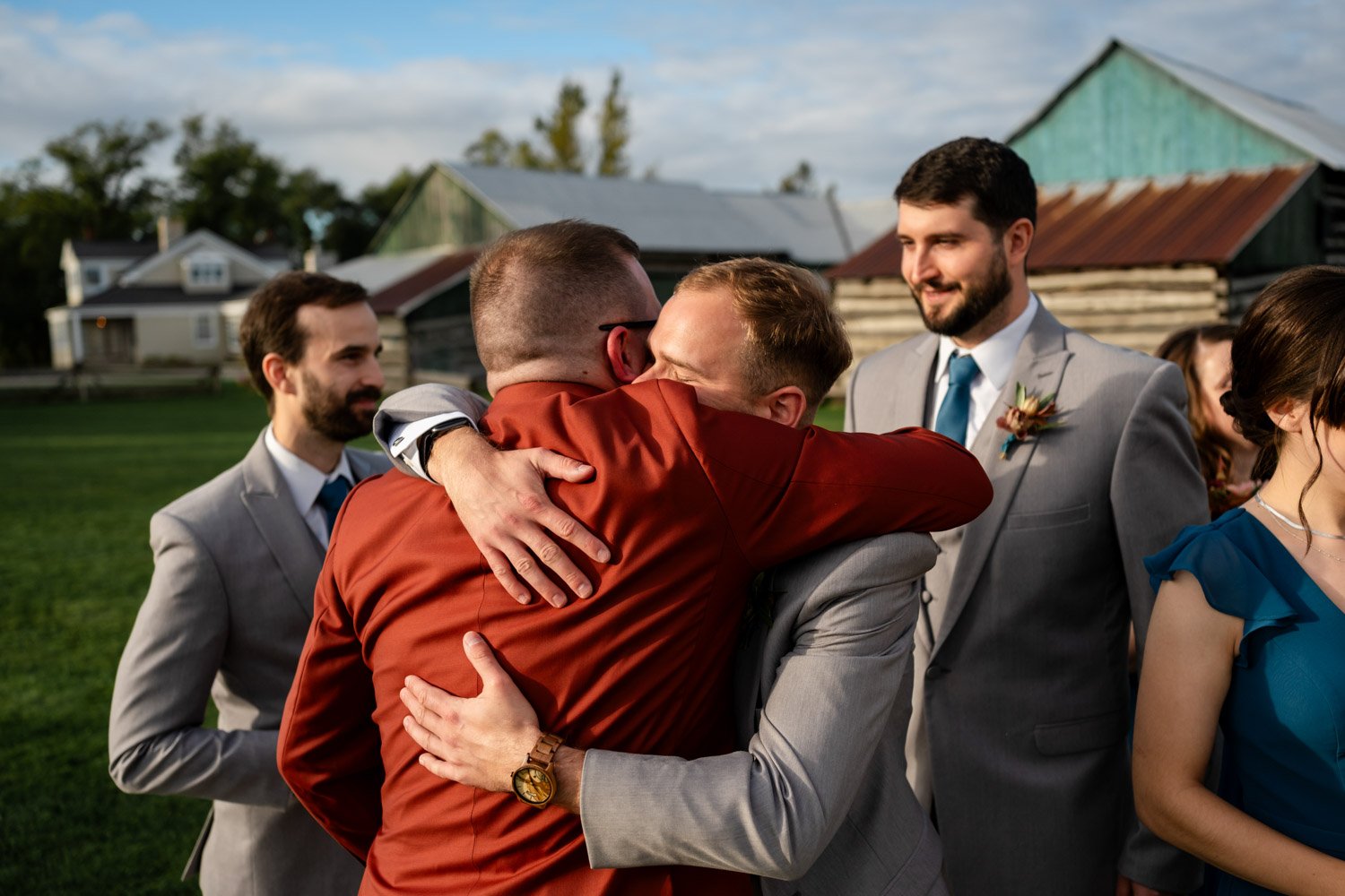 emotional hugging after a wedding ceremony