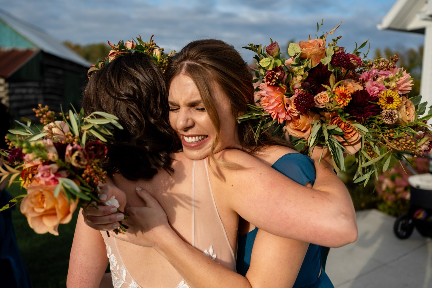 emotional hugging after a wedding ceremony