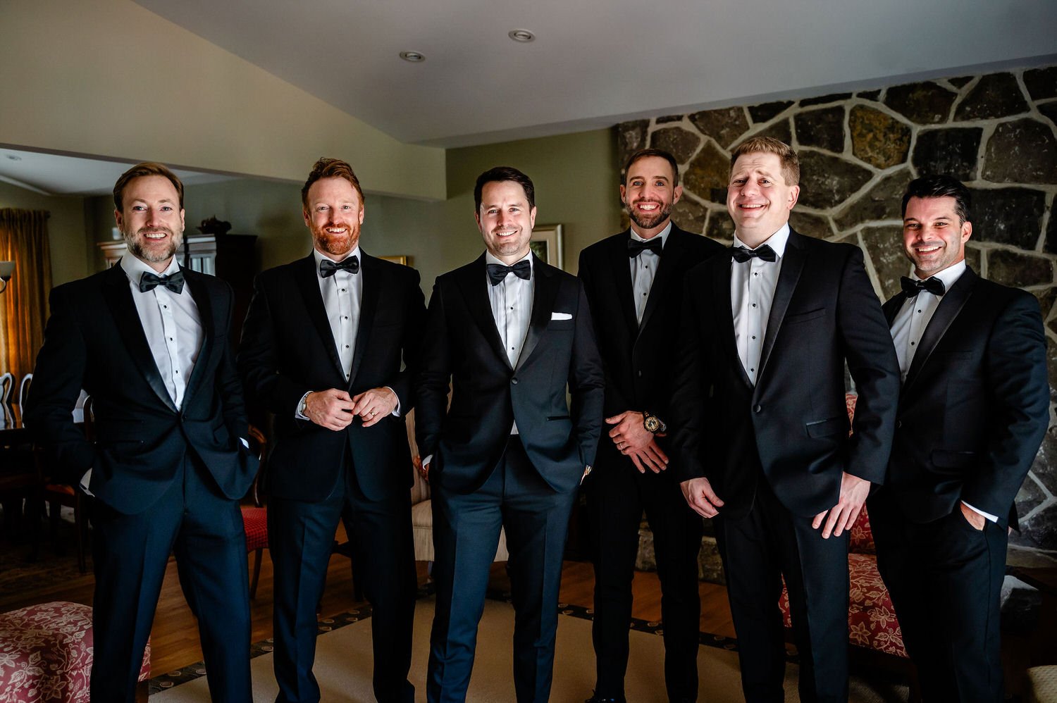 a photograph of groomsmen before a wedding ceremony