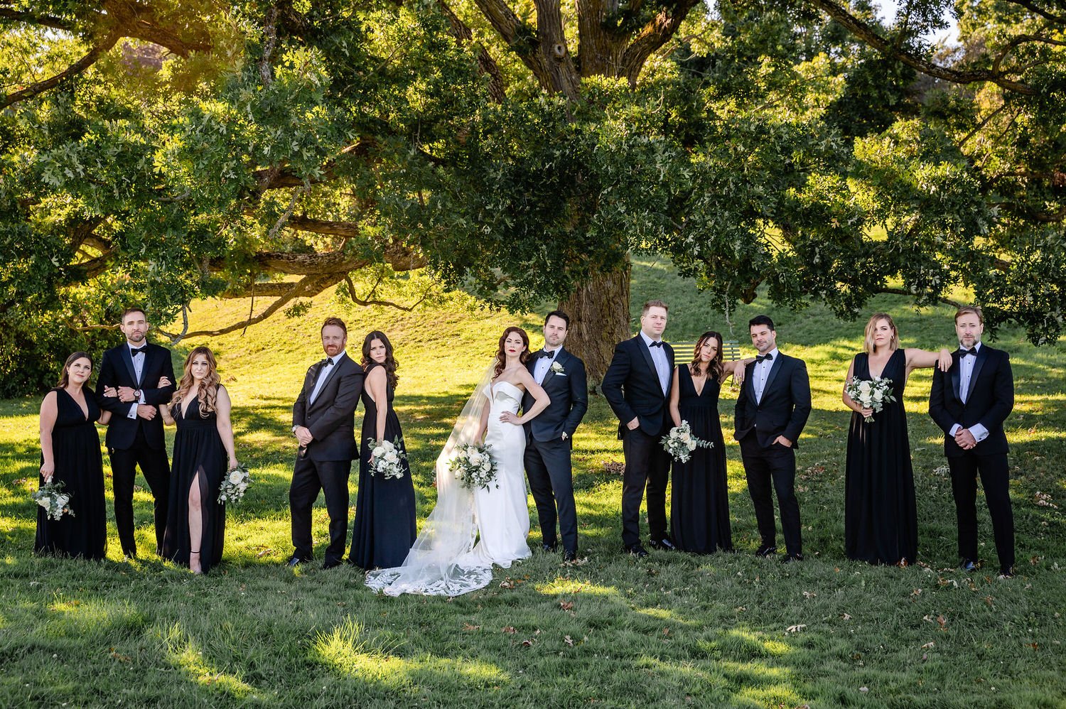 wedding party photograph in the arboretum in ottawa