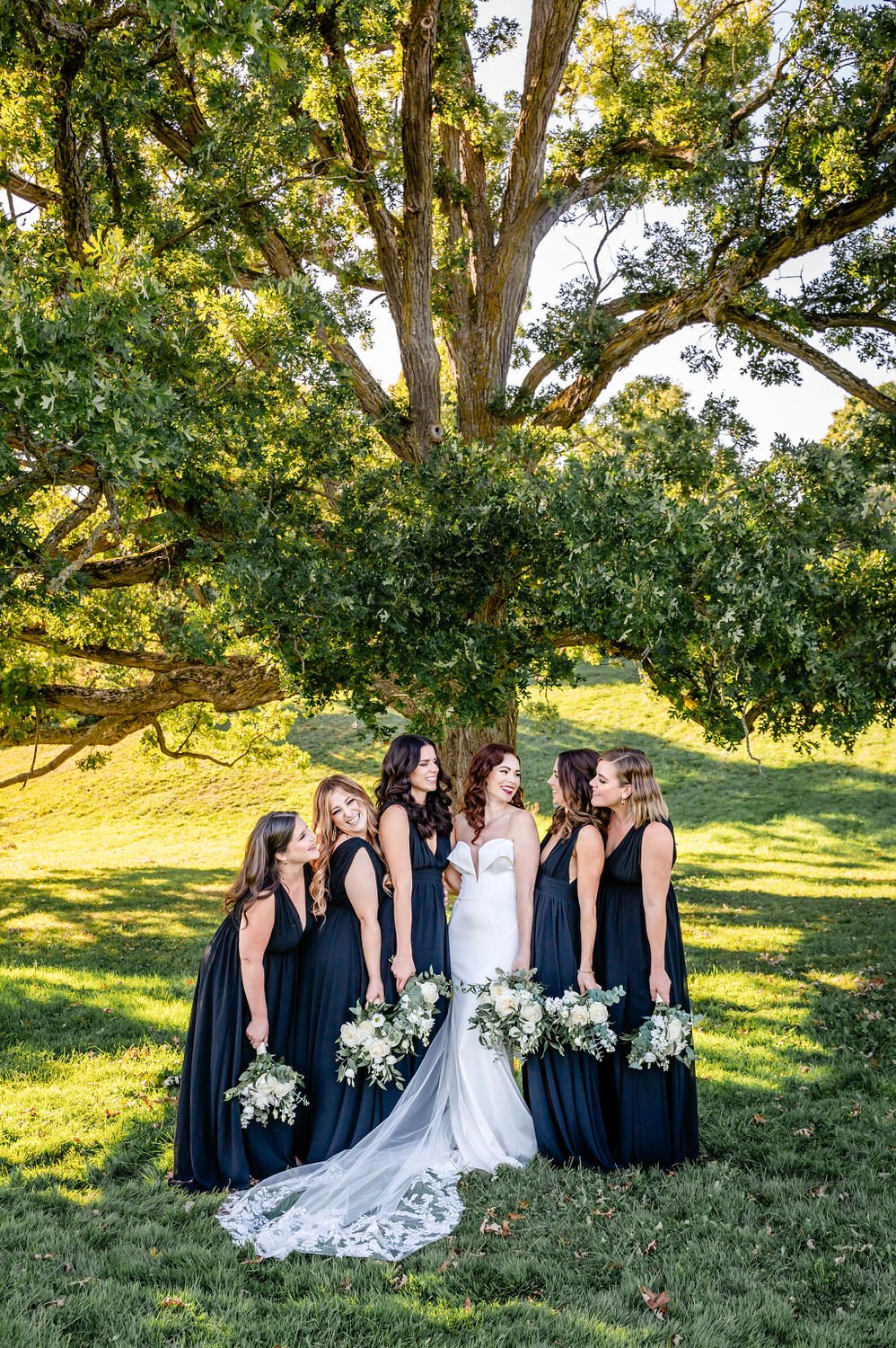 wedding party photograph in the arboretum in ottawa