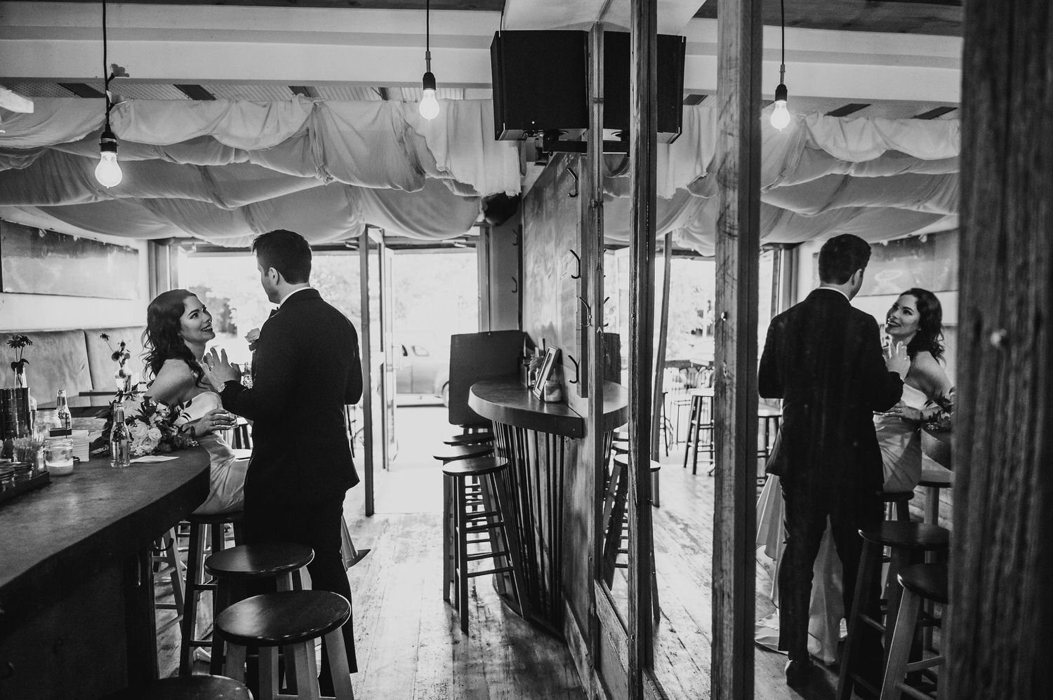 bride and groom in a restaurant on their wedding day