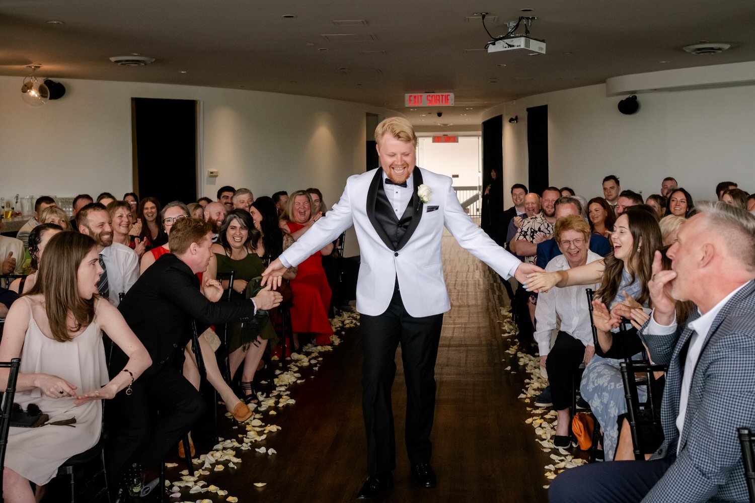 groom walking down the aisle
