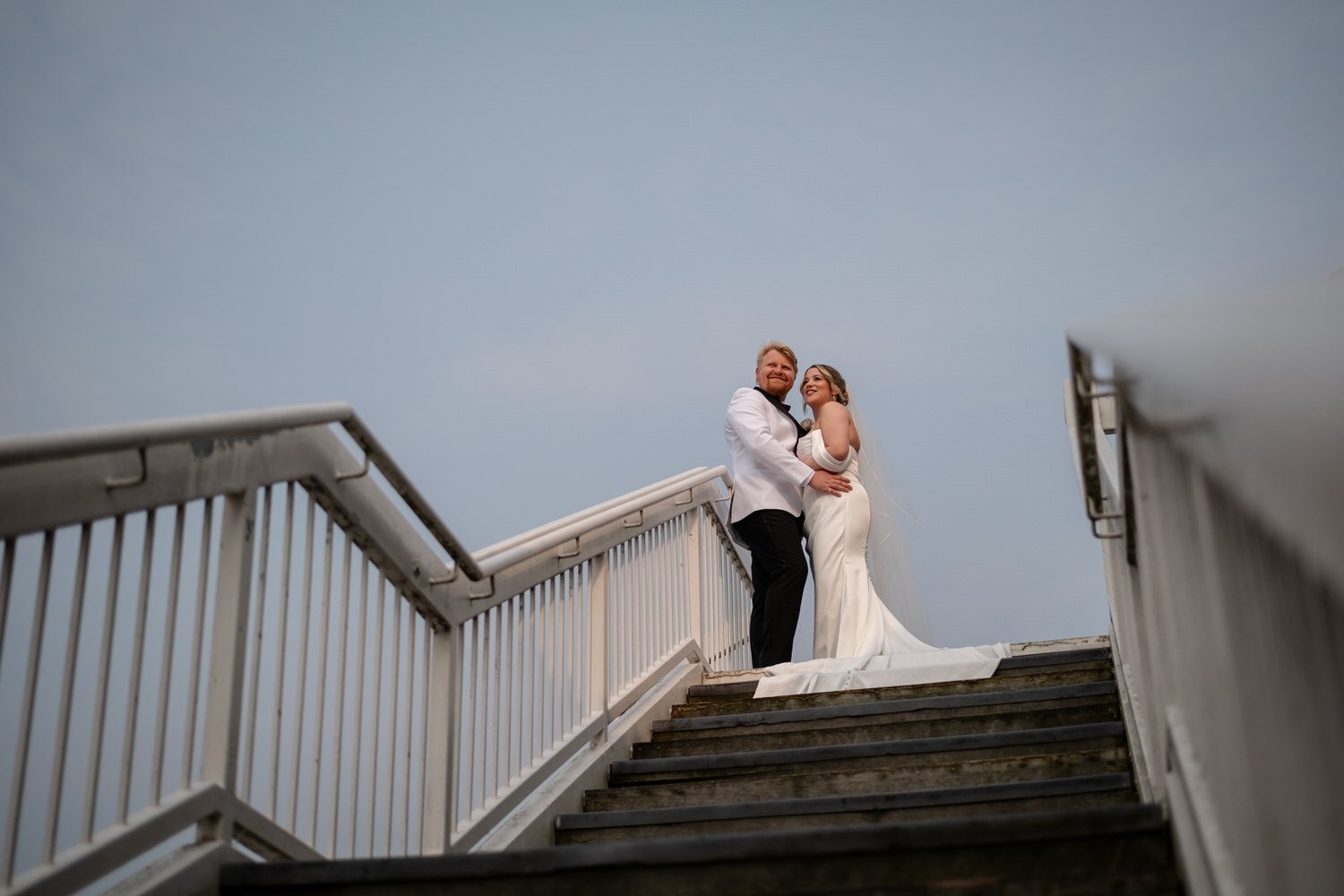 photograph of a newly married couple on the terrace at Lago