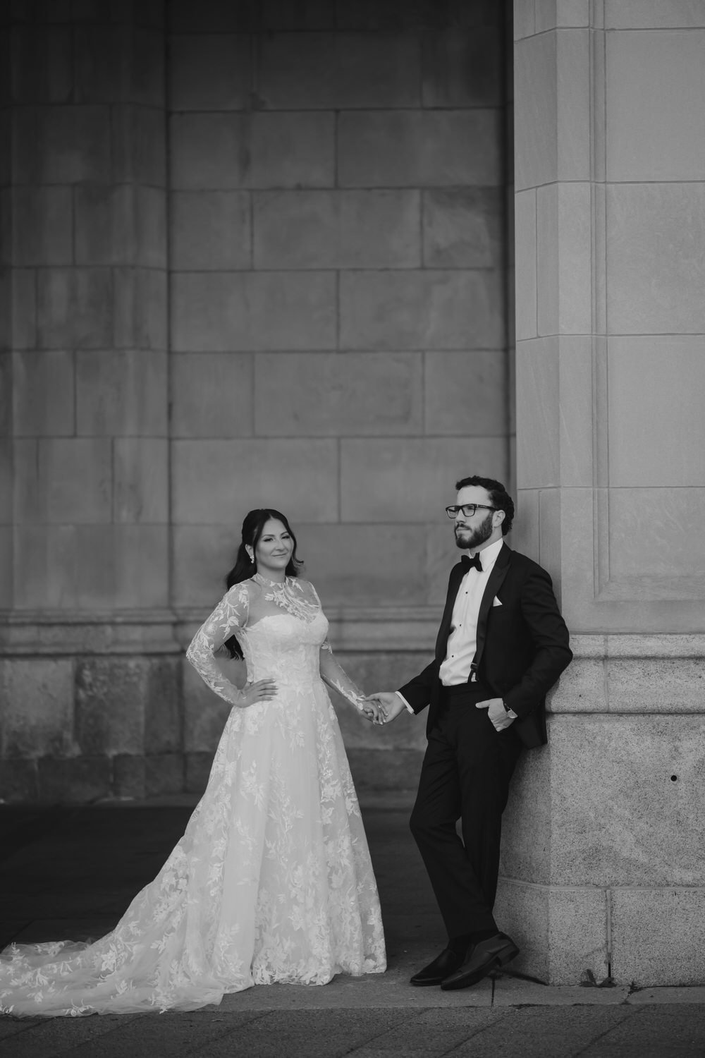 Portrait of a bride and groom outside of the Chateau Laurier