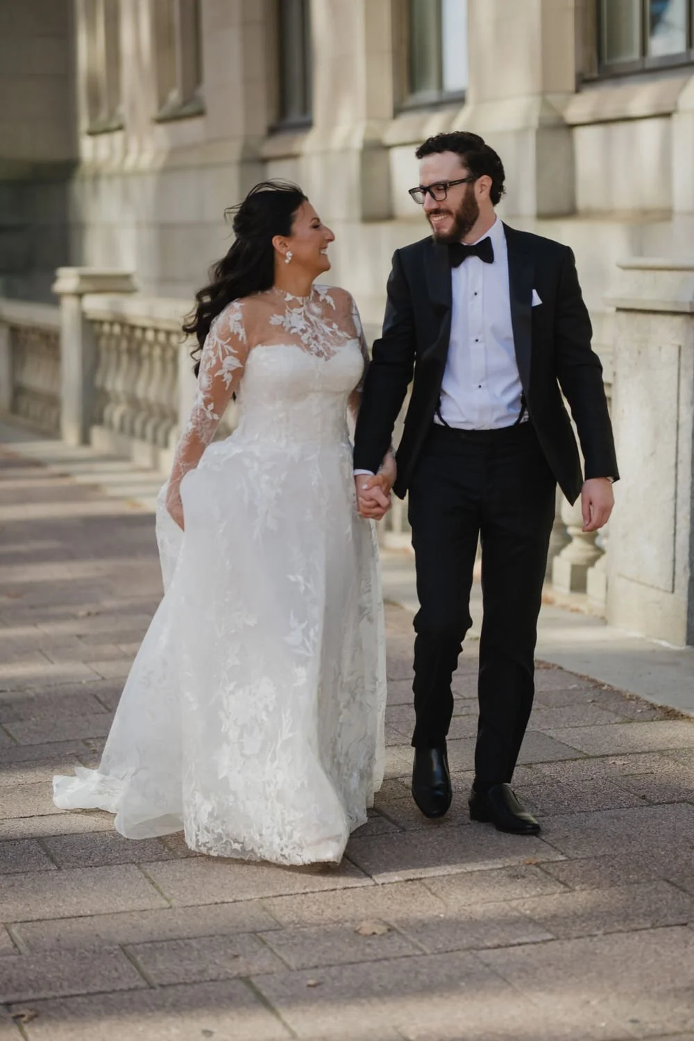Portrait of a bride and groom outside of the Chateau Laurier