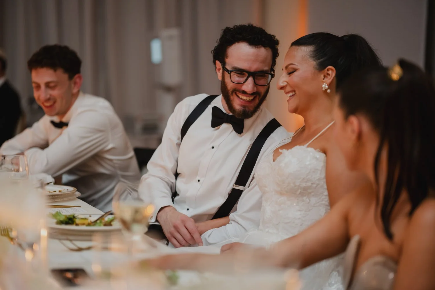 a wedding reception in the candle lit ball room at the chateau laurier